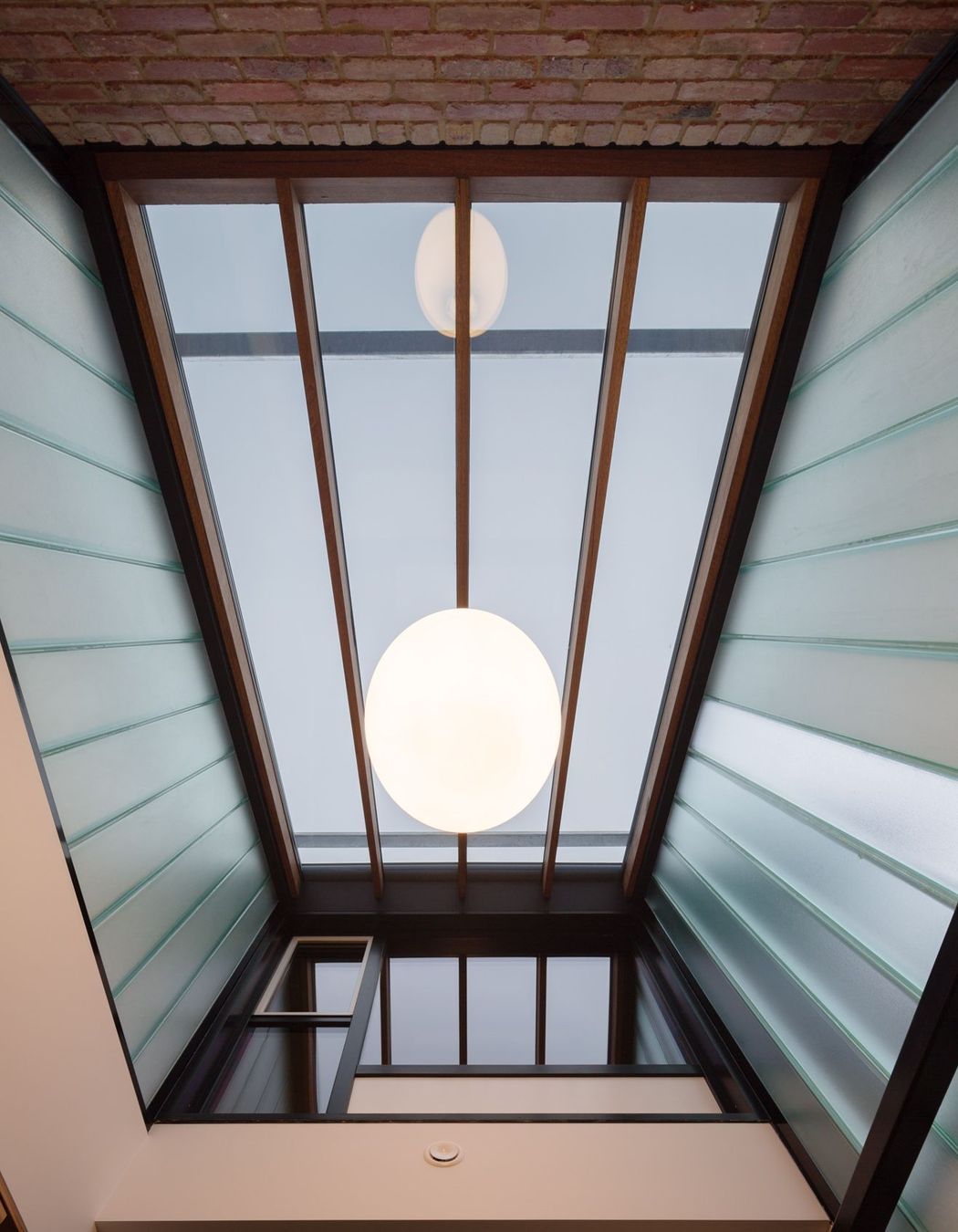 Double glazed skylight and U-form stained glass atrium