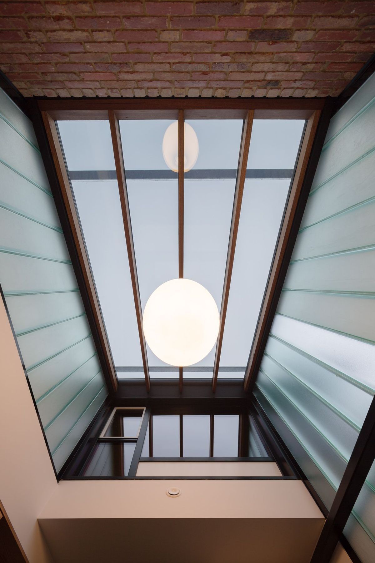 Double glazed skylight and U-form stained glass atrium