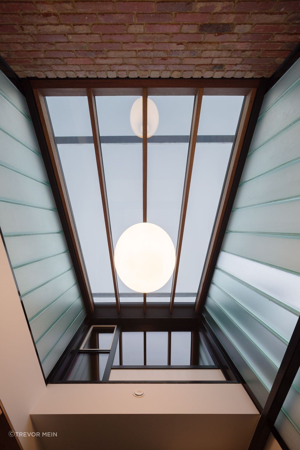 Double glazed skylight and U-form stained glass atrium