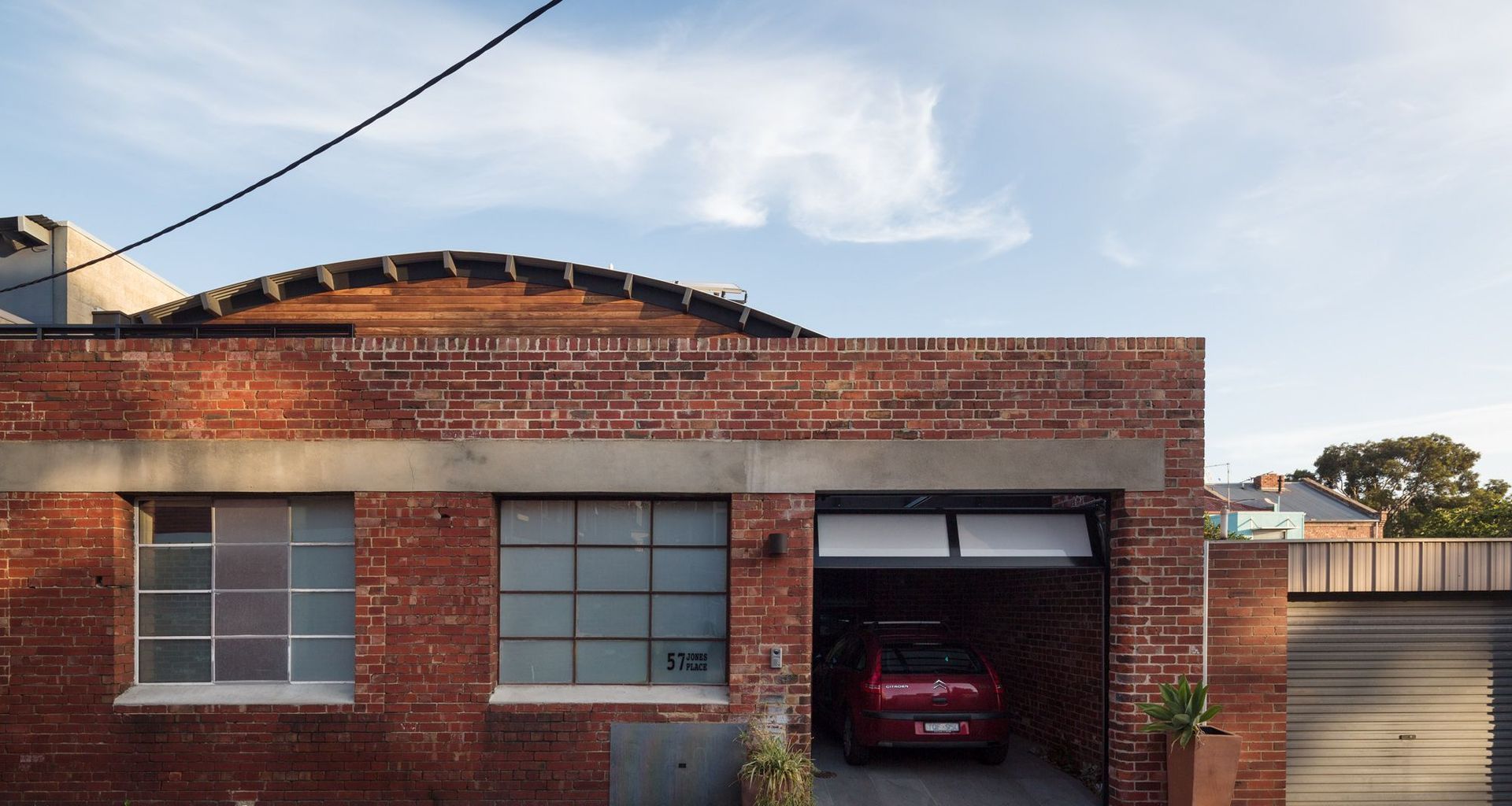 Brick exterior passive warehouse conversion
