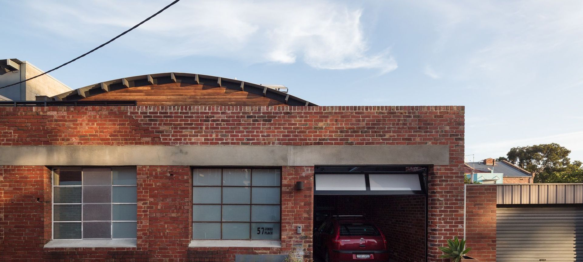 Brick exterior passive warehouse conversion