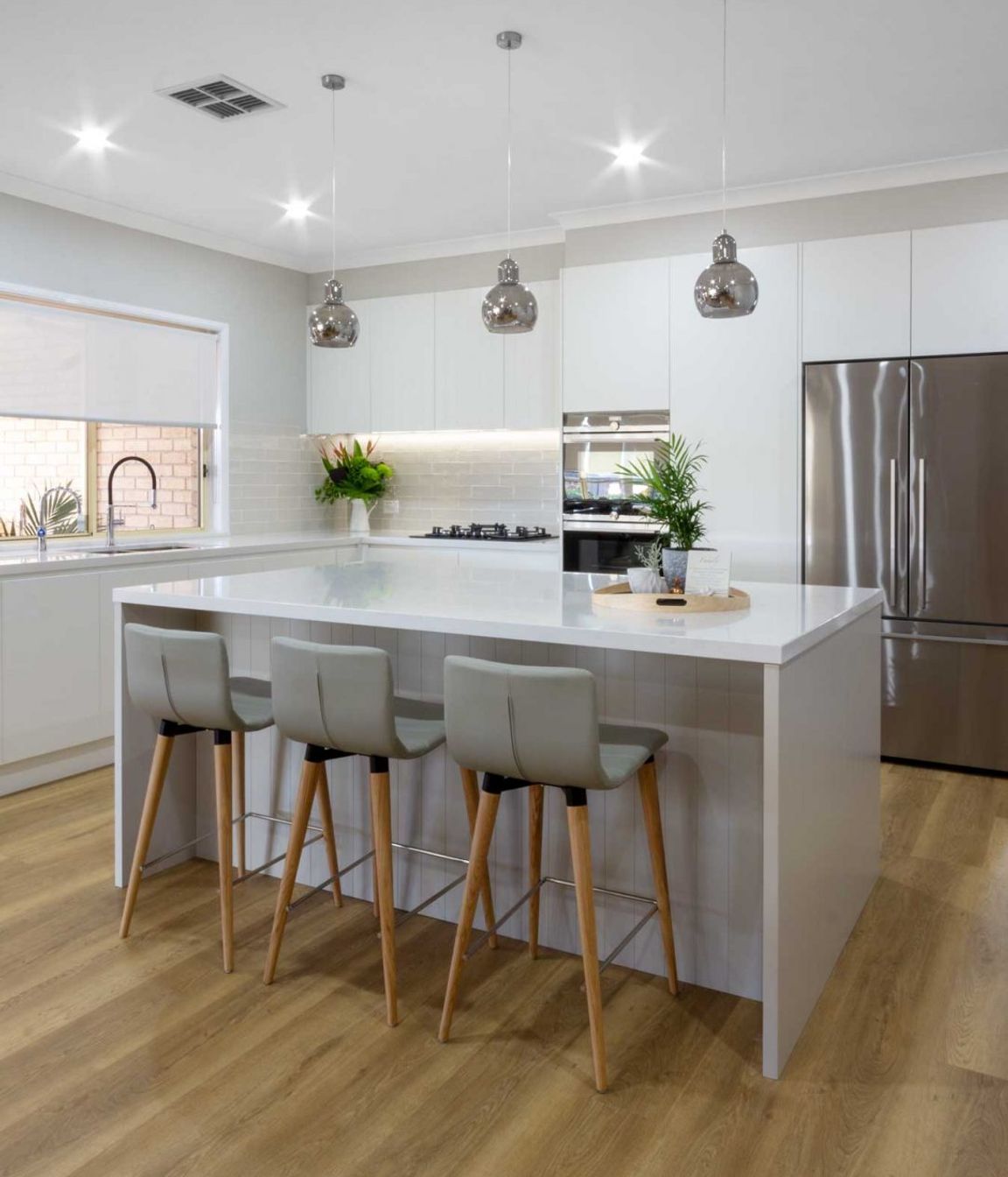 modern-kitchen-design-sydney-white-kitchen-bosch-fisher-paykel-dulux-silestone-siemens-zip-tap-5-1084x1445.jpg