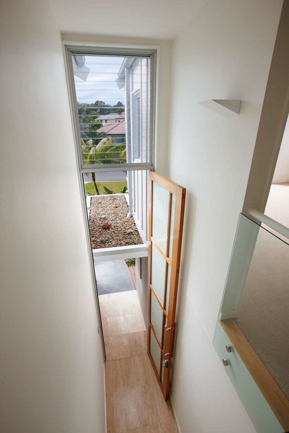 Oversized entry door and floating canopy