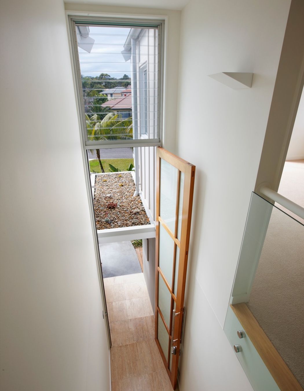 Oversized entry door and floating canopy