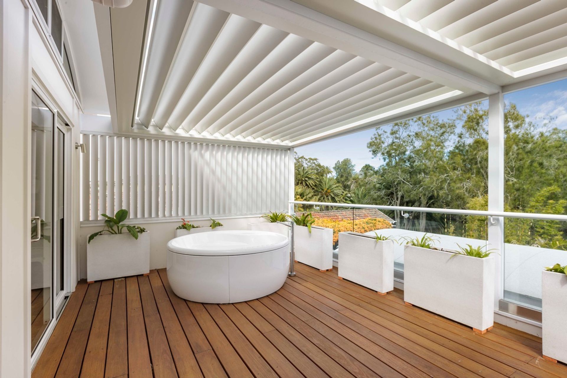 Main bedroom upper level deck with operable roof