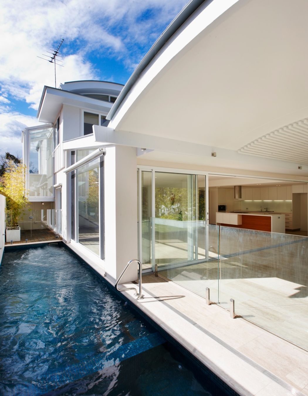 Spa and lap pool to side courtyard- stair beyond