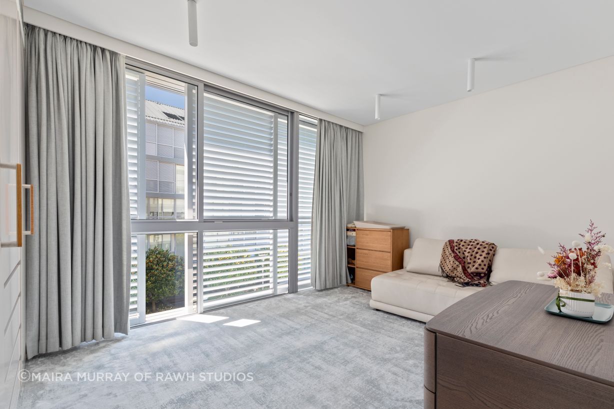 Bedroom 3, showing new carpet and lighting selections.