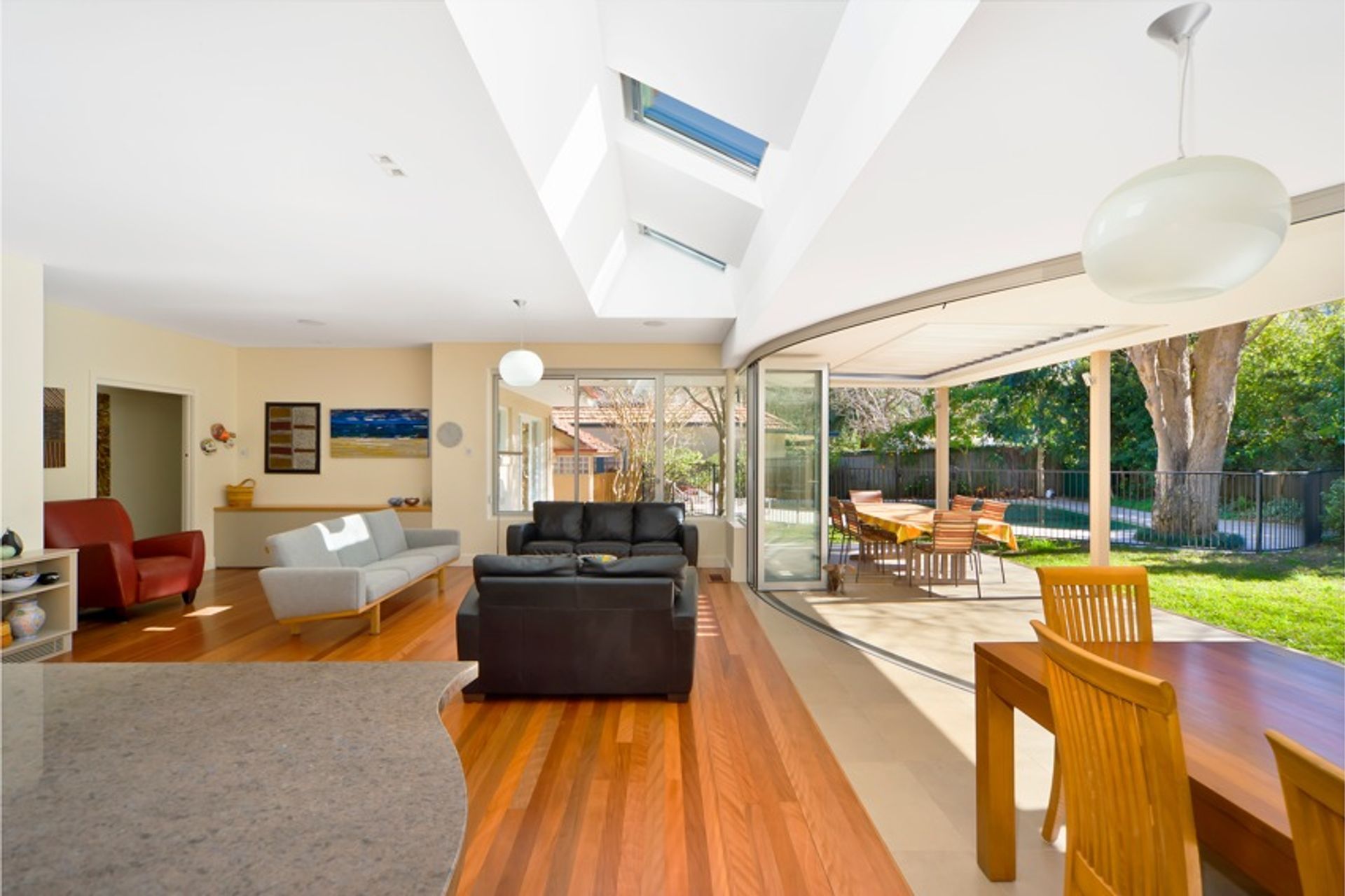 Reconfigured kitchen, dining and living areas with covered terrace