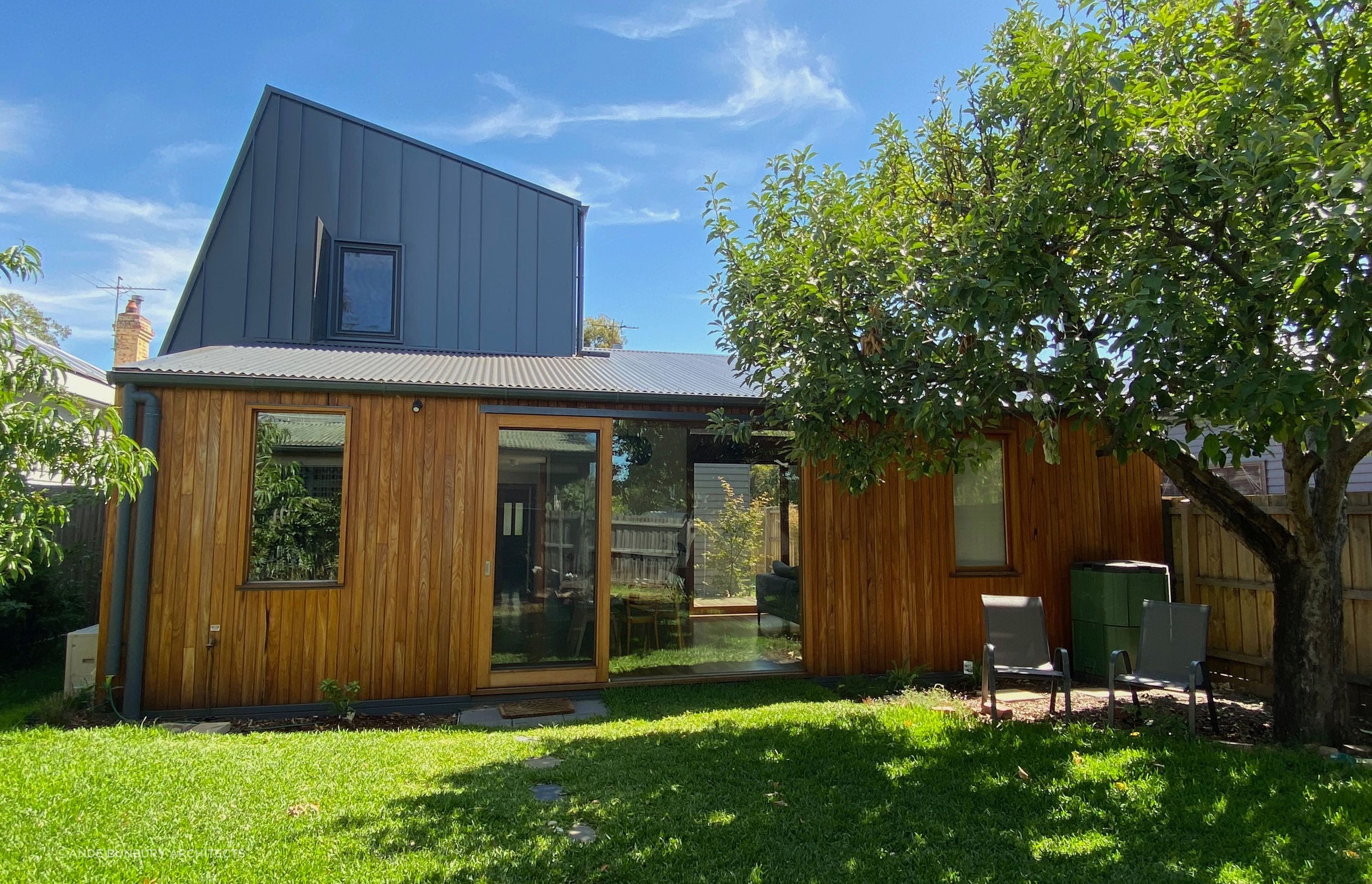 The building form has been kept low at the back of the house to minimise overshadowing the garden