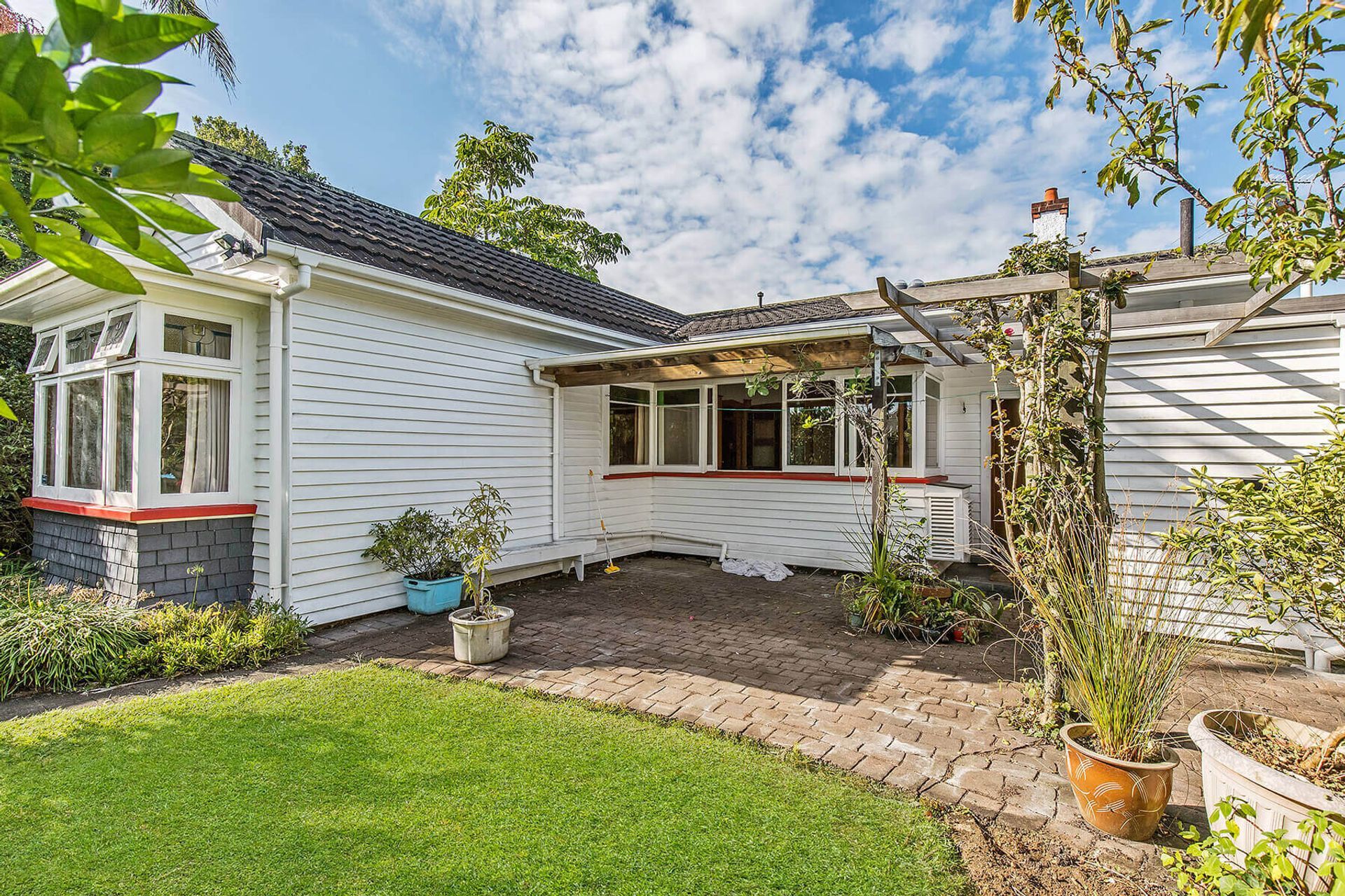 Removal of existing patio was required to open house up into the backyard.
