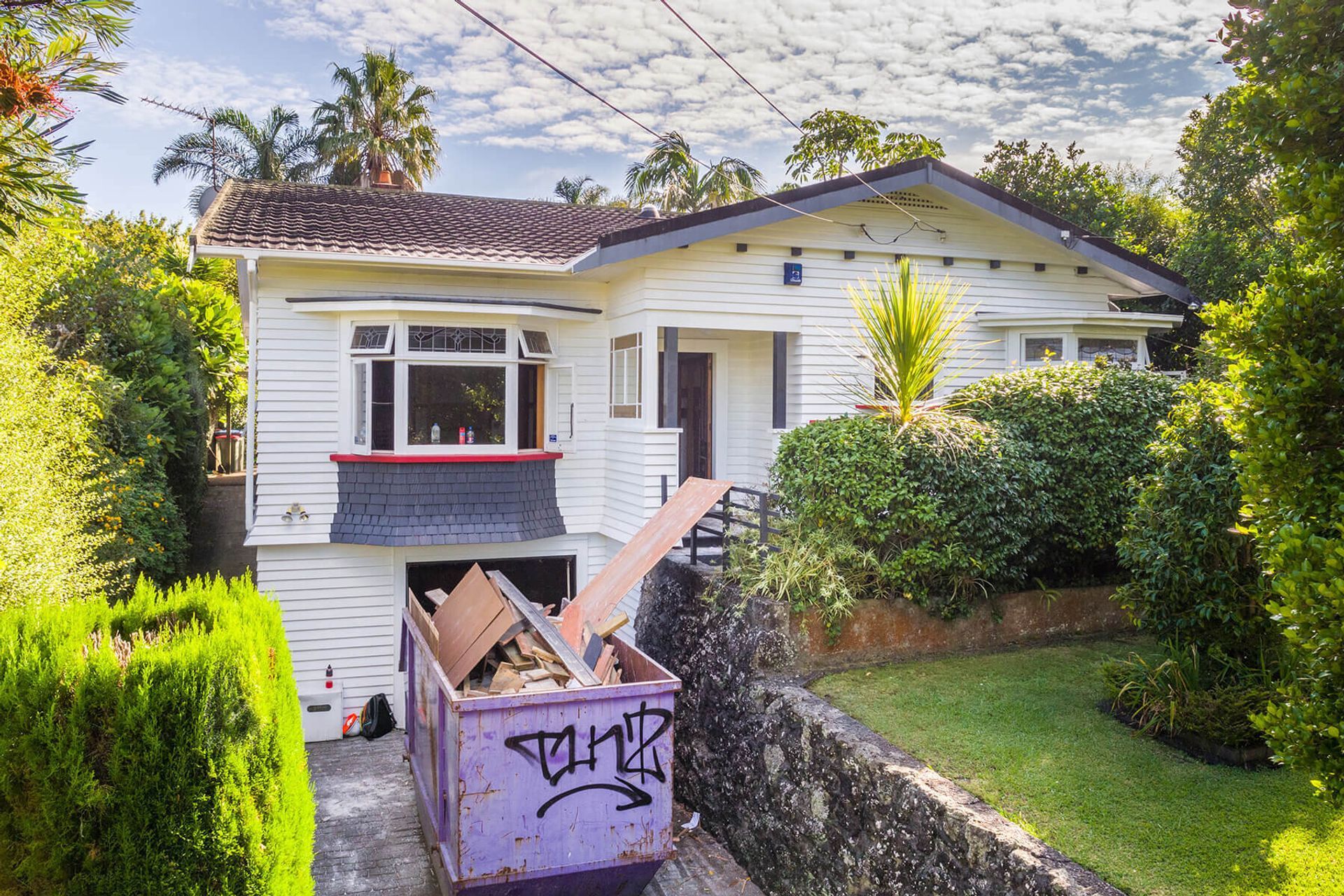 Excavation and redevelopment of existing garage into new family room.