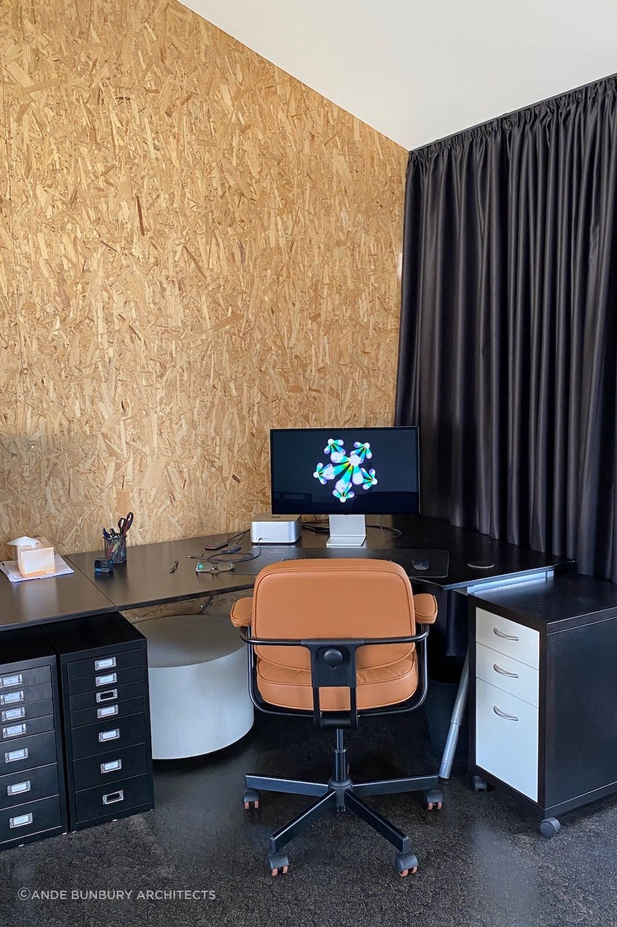 Office with exposed structural insulated panels