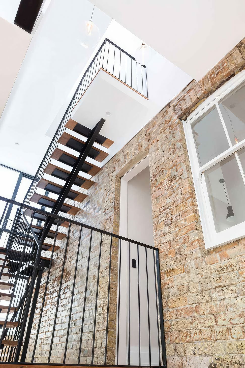 up12-Stairs-looking-up-inc-landing-fix-standard-scale-200x.jpg