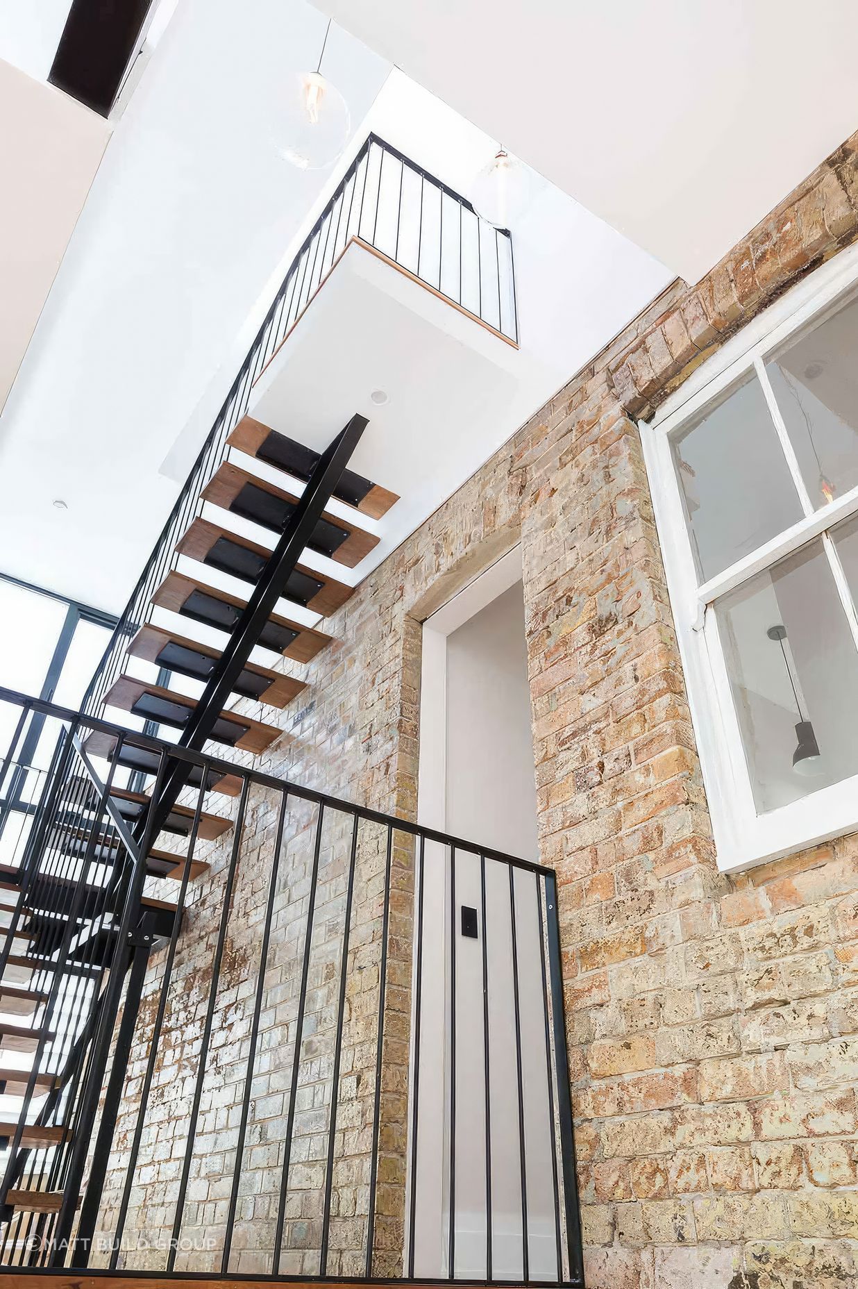 up12-Stairs-looking-up-inc-landing-fix-standard-scale-200x.jpg