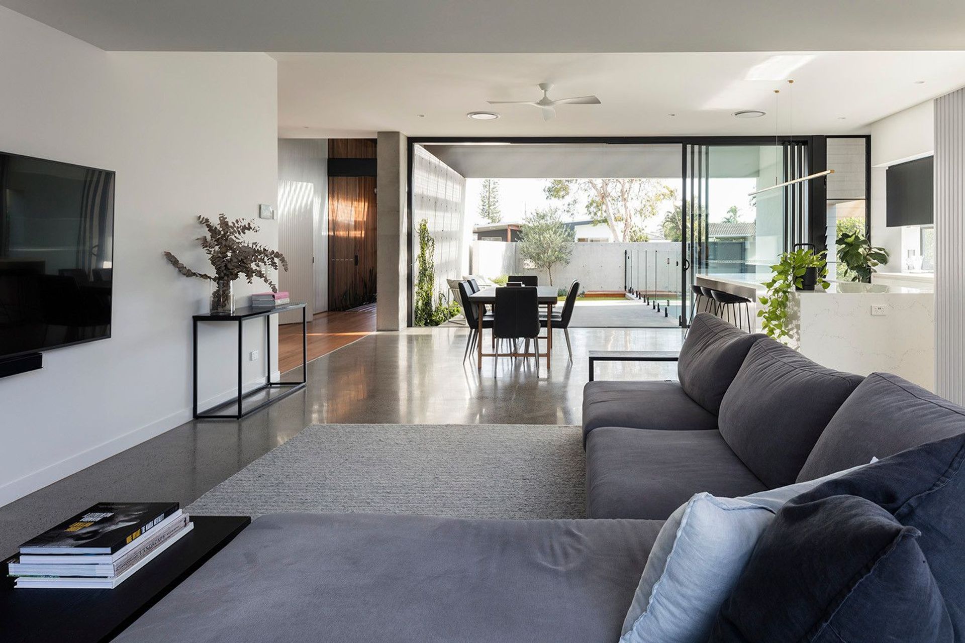 Morrison Residence - Living Room. Open living space flowing through to the dining and garden.