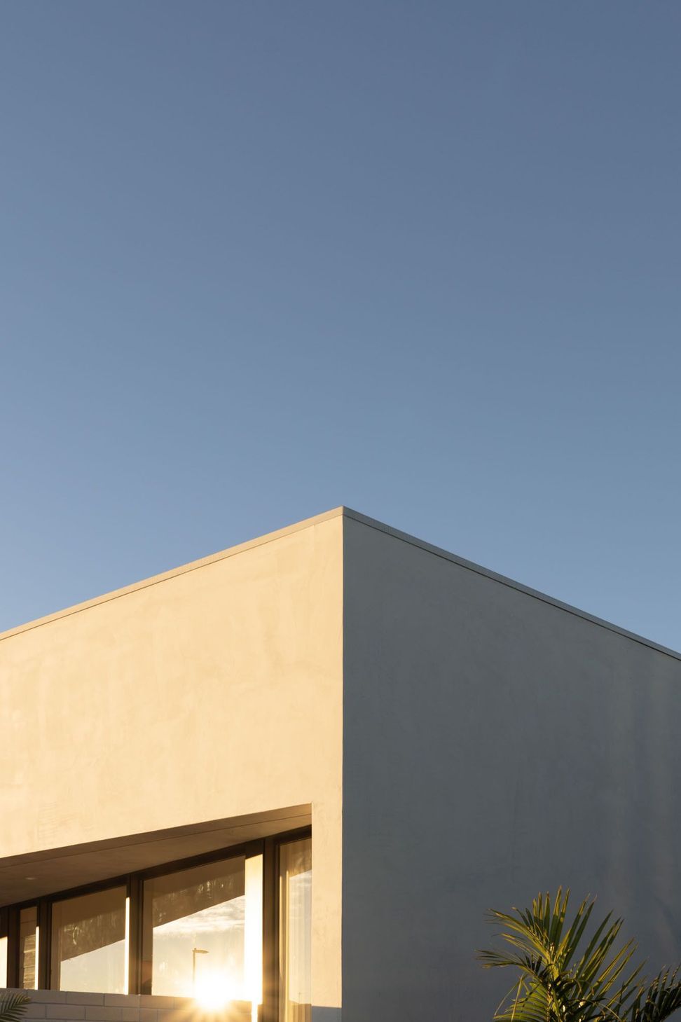 Warrego - Exterior. Crisp rendered roof edge against the sky.
