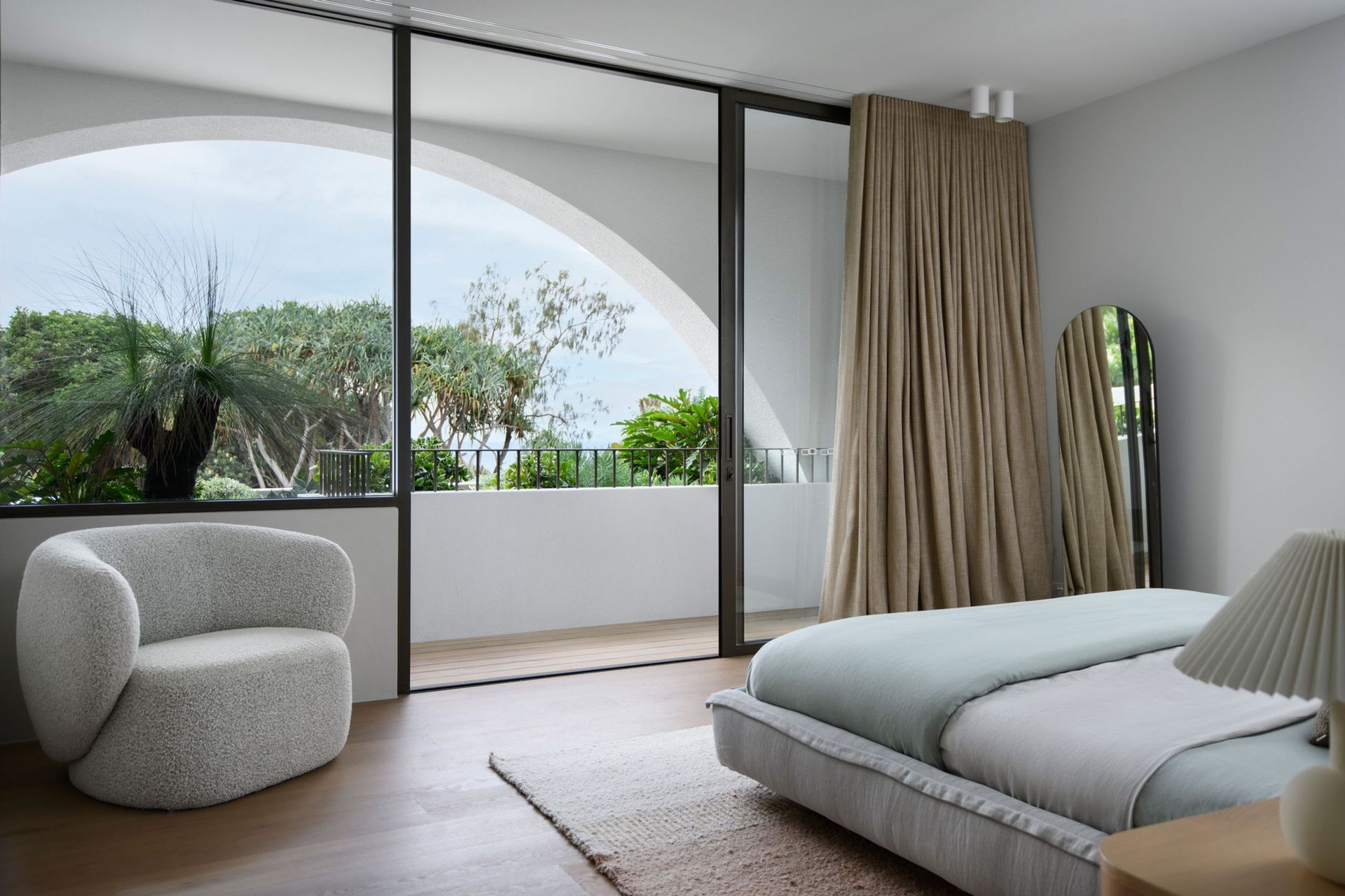 Villa Solare - Bedroom. Bedroom opening to a balcony with ocean views.