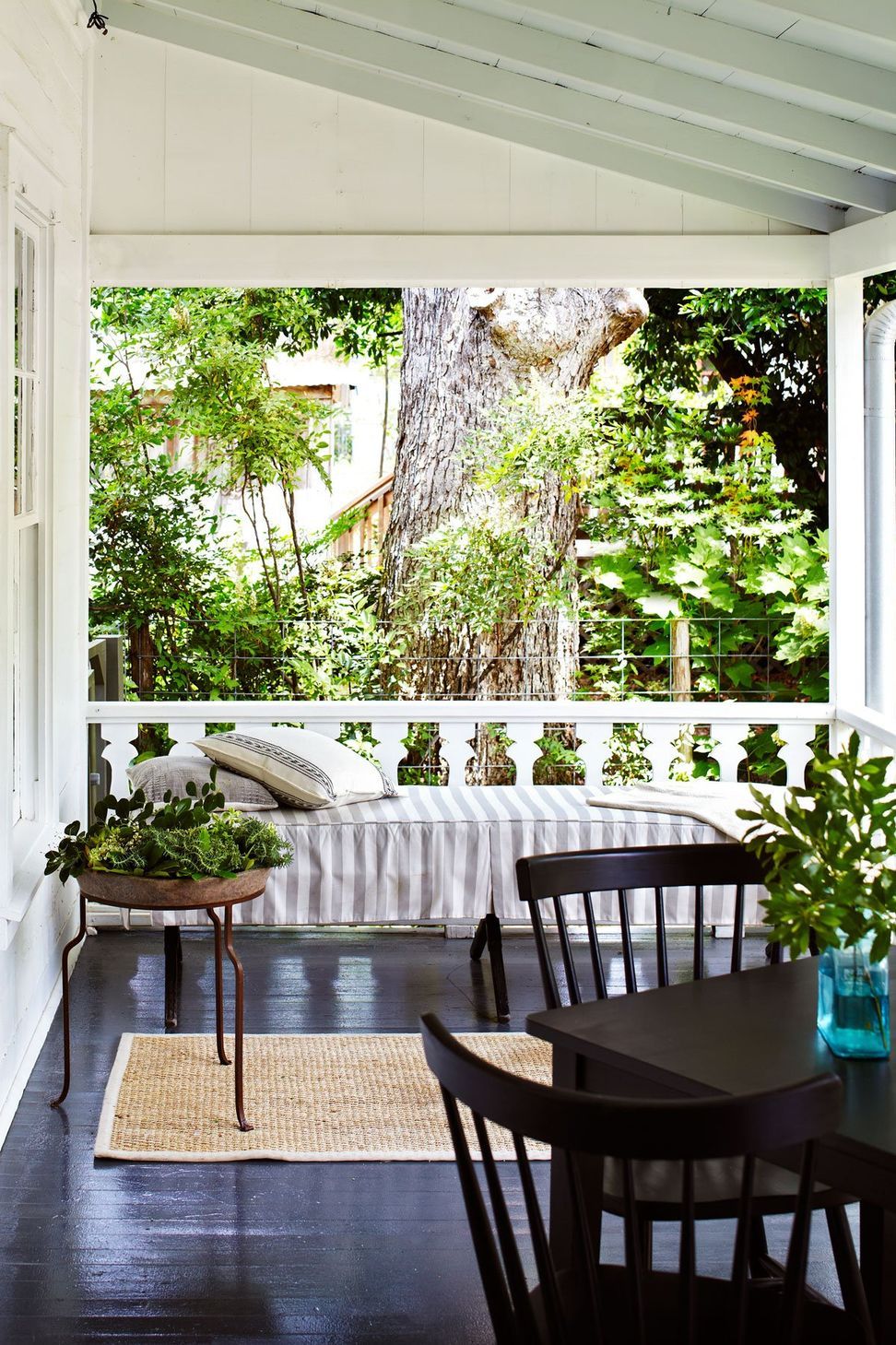 13HistoricHouseCuppettKilpatrickArchitectureandInteriorDesignaustin-tx-porch-bench-succulents-outdoor-dining-area.jpg