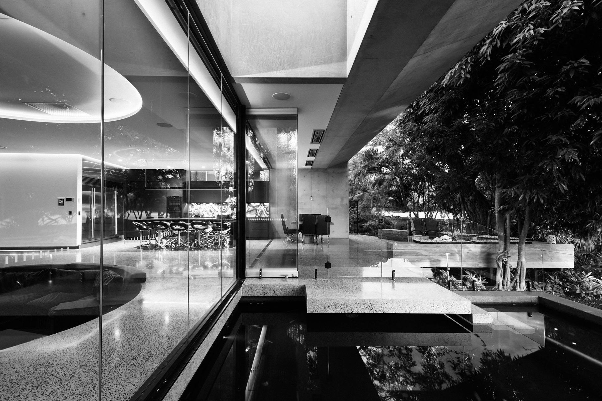 McGovern Residence - Living Room. Glazed corner opening to the pond and garden.