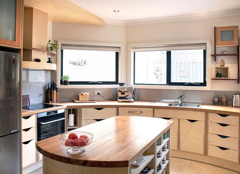 Plywood and Recycled Timber Curved Kitchen