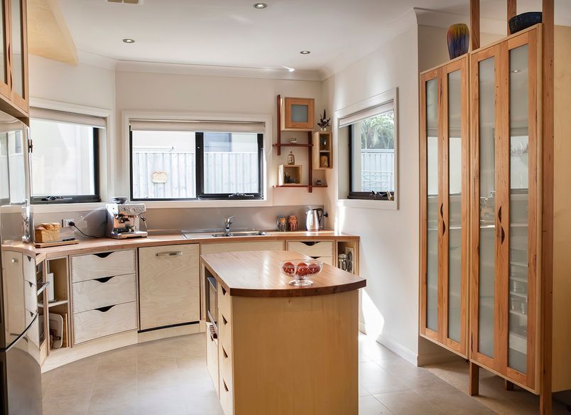Plywood and Recycled Timber Curved Kitchen