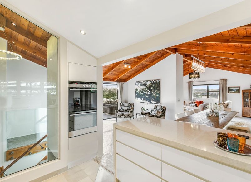 “From Stairs to Storage: How Recessing a Wall Oven can Transform the Kitchen”
