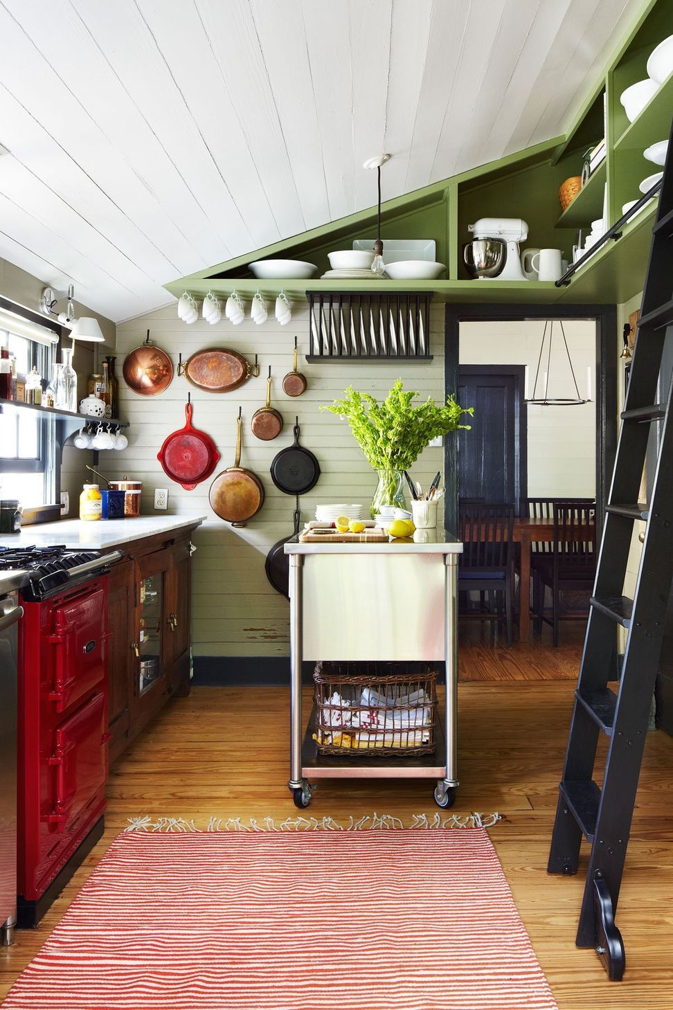 6HistoricHouseCuppettKilpatrickArchitectureandInteriorDesignaustin-tx-historic-kitchen-red-range-sliding-ladder.jpg