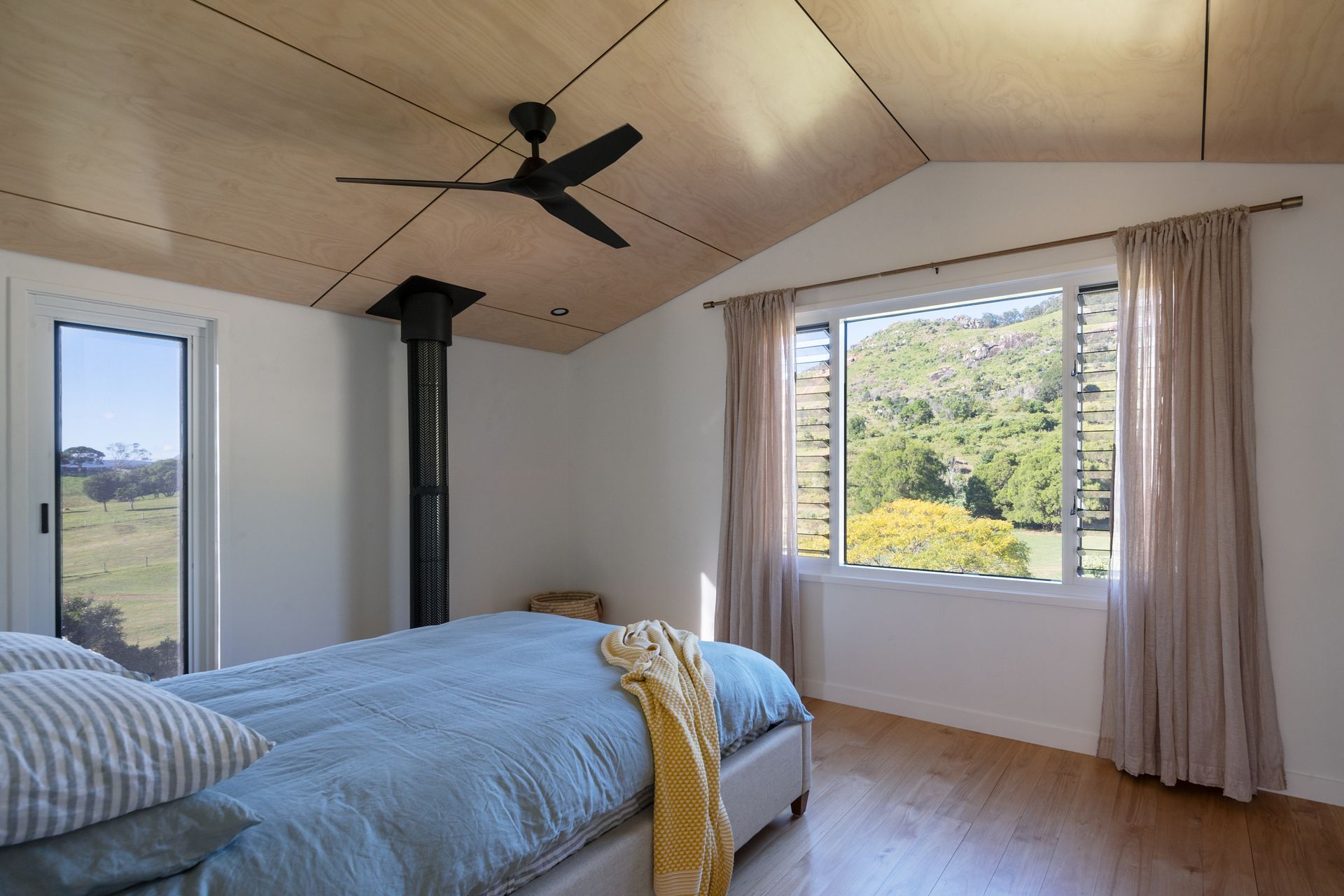 Low raked ceilings purposely evoke a sense of timeless comfort to the sleeping spaces.