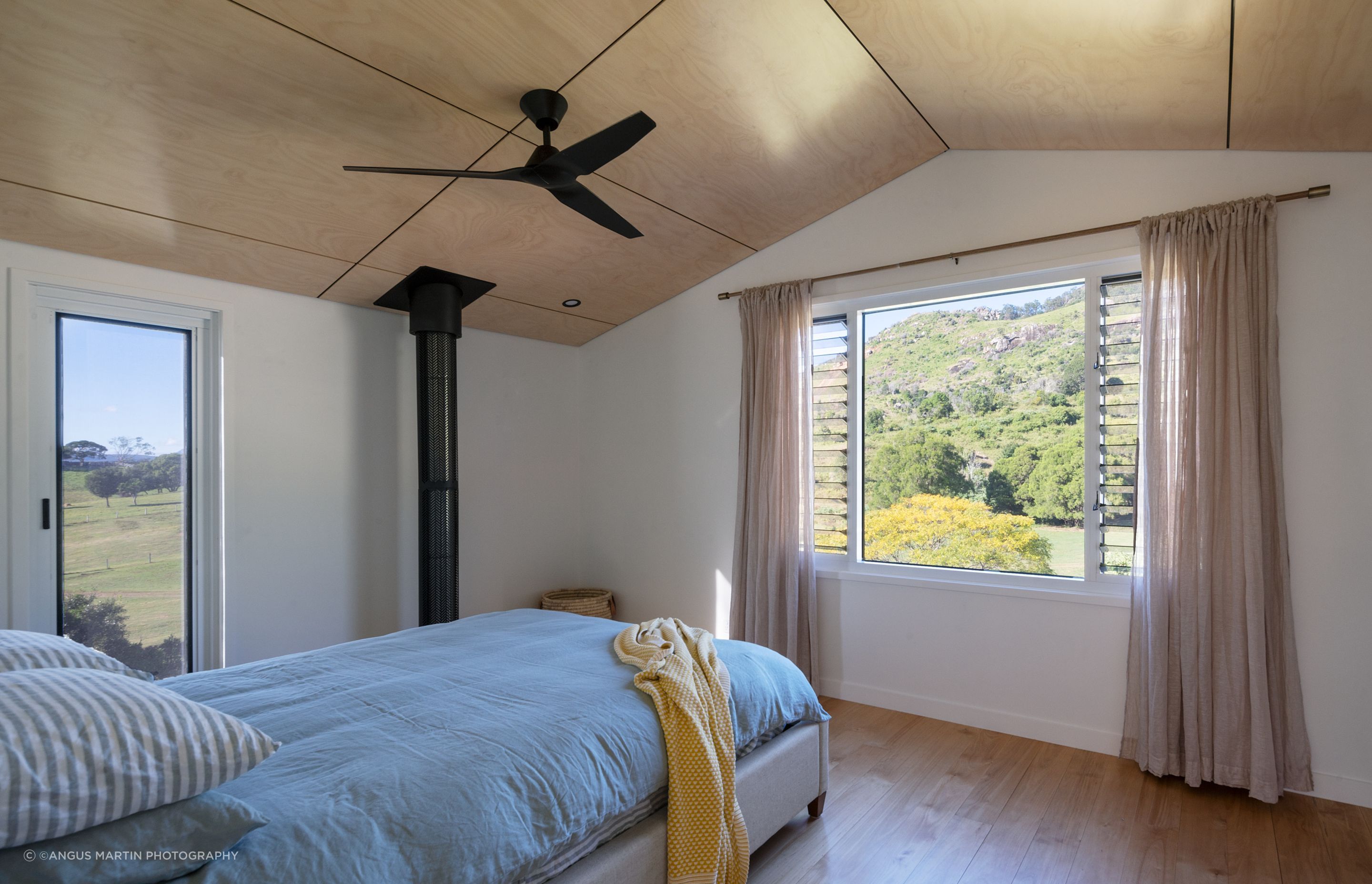 Low raked ceilings purposely evoke a sense of timeless comfort to the sleeping spaces.