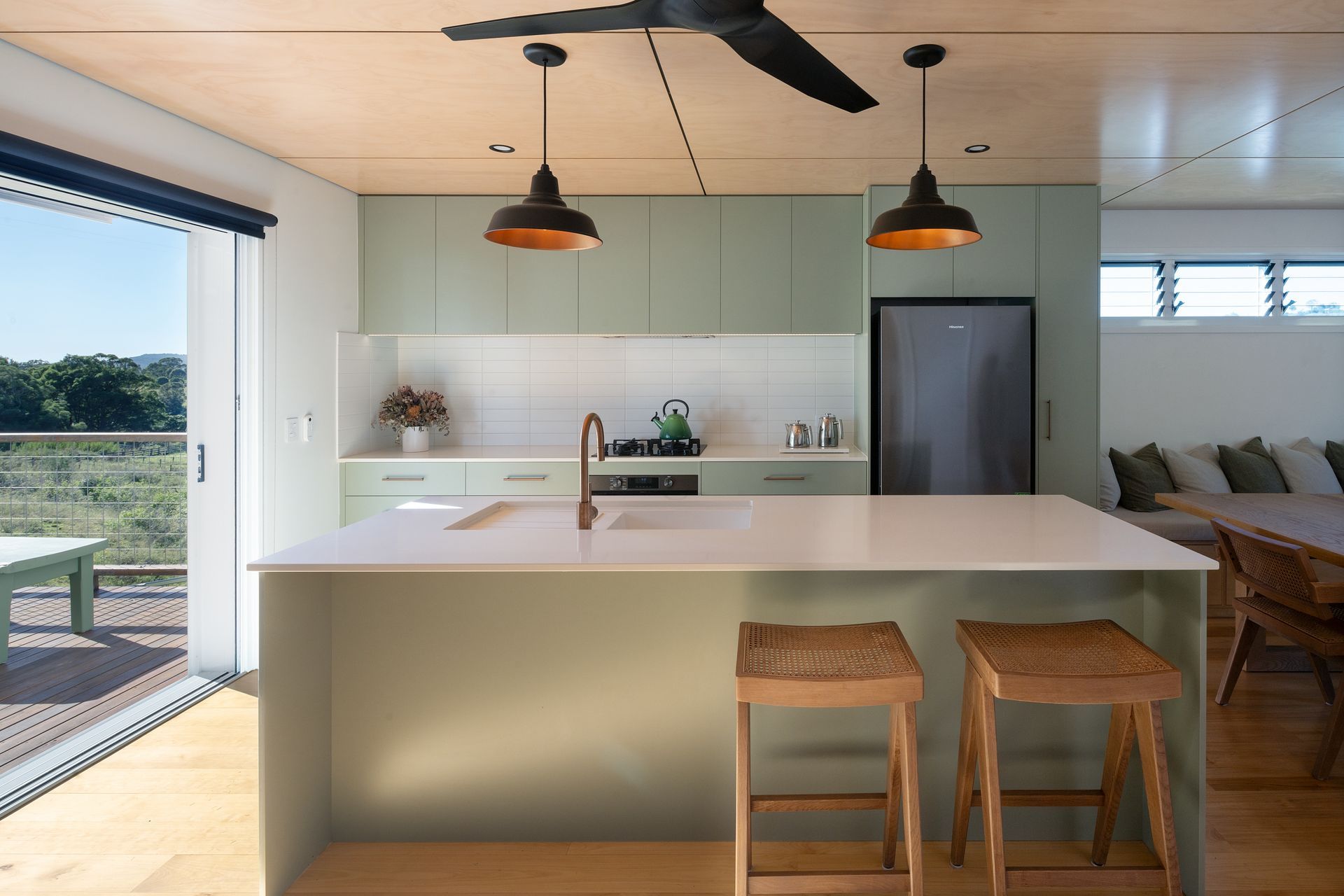 The kitchen workzone serves routine social activities and informal dining.