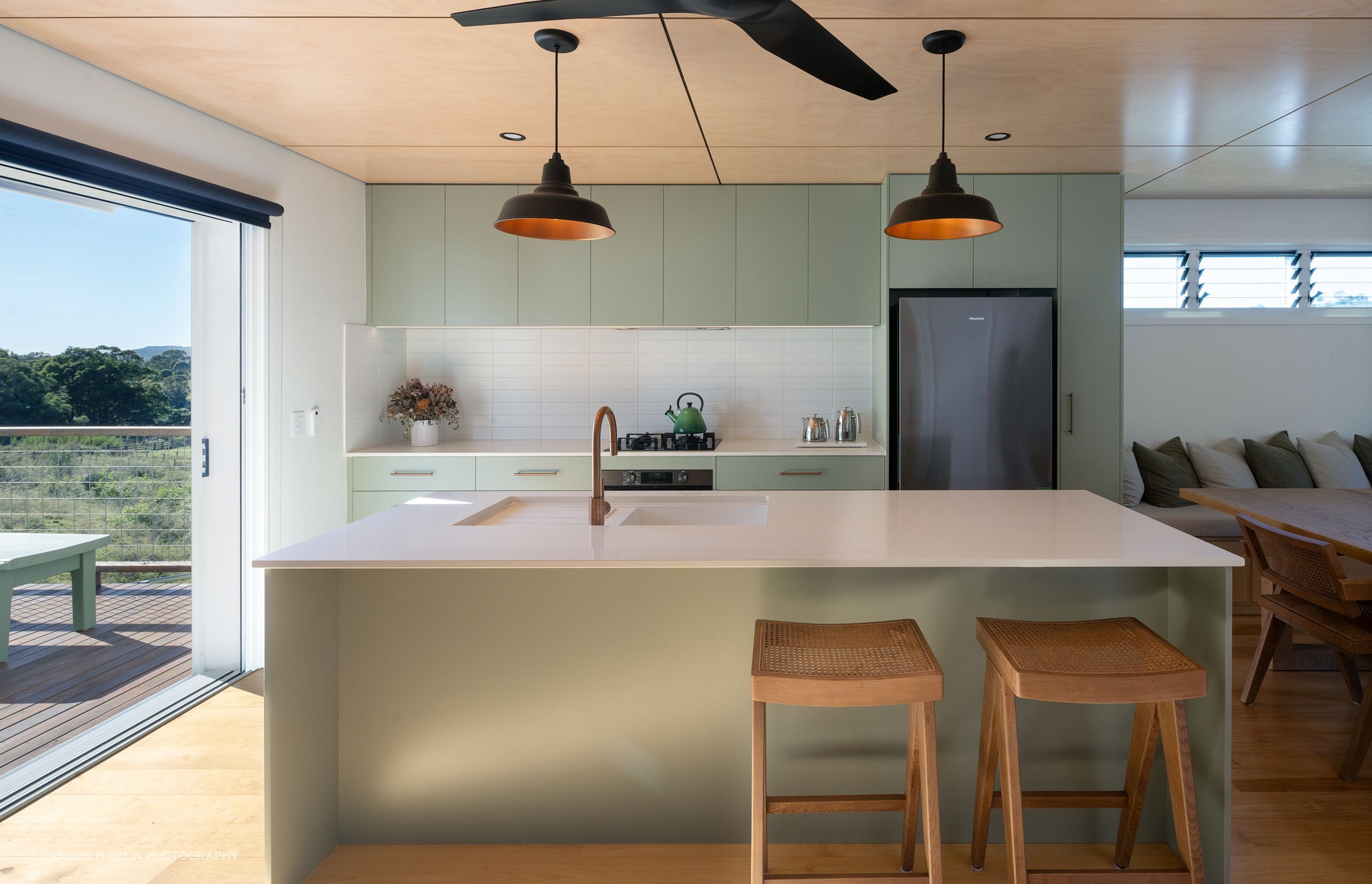 The kitchen workzone serves routine social activities and informal dining.