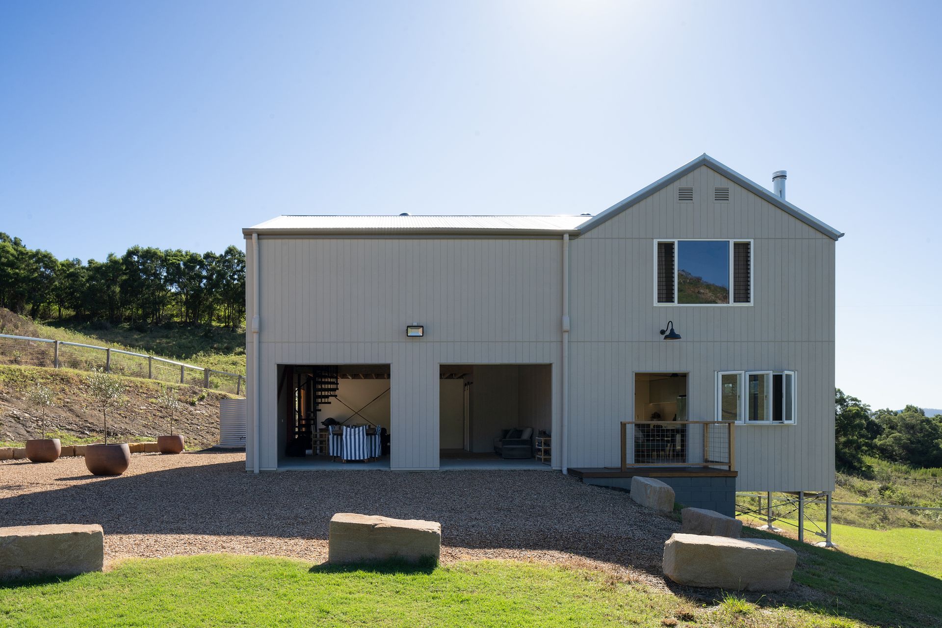 Initially conceived as a workers’ cottage with an integrated farm workshop, the dwelling has evolved into a highly compact yet fully flexible residence capable of functioning as a family home, short-stay chalet, or intimate event venue.
