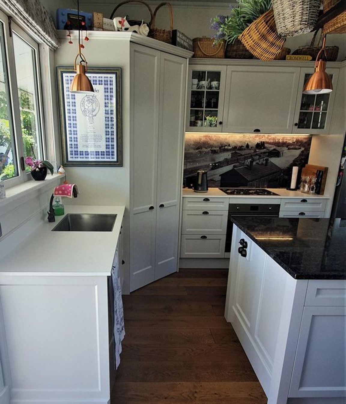 Artwork, lighting and the custom splash back add personal touches