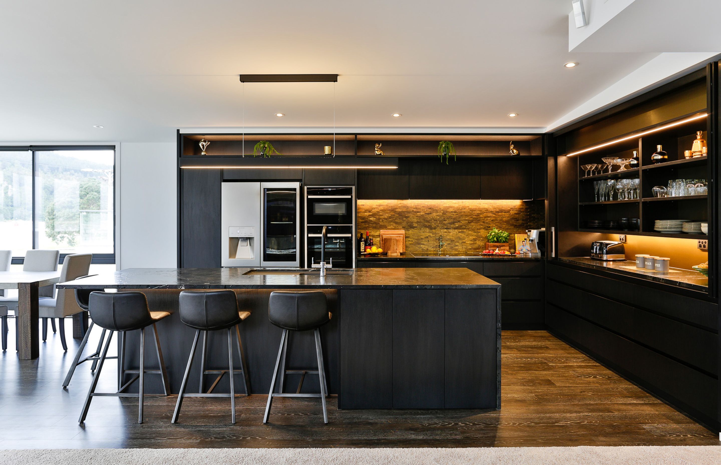 Bestwood Melamine, Black Wilderness. Design by Carly Mohan-Druce, Mastercraft Kitchens Whangamata.