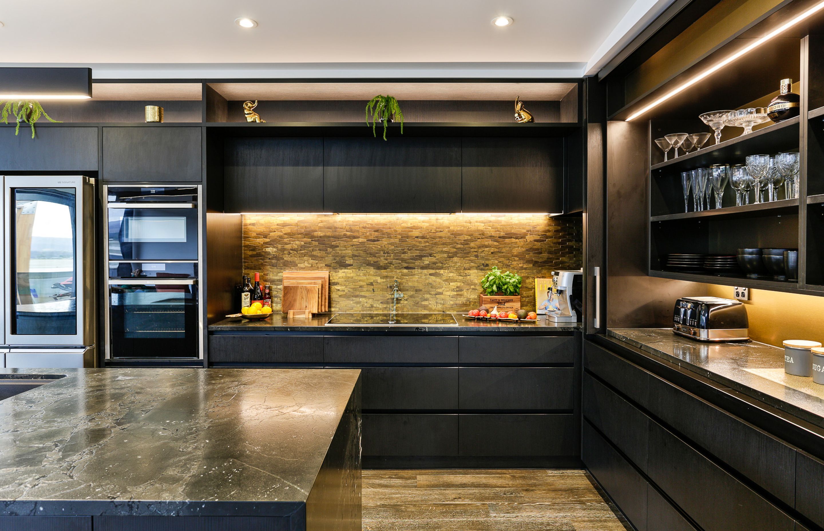 Bestwood Melamine, Black Wilderness. Design by Carly Mohan-Druce, Mastercraft Kitchens Whangamata.