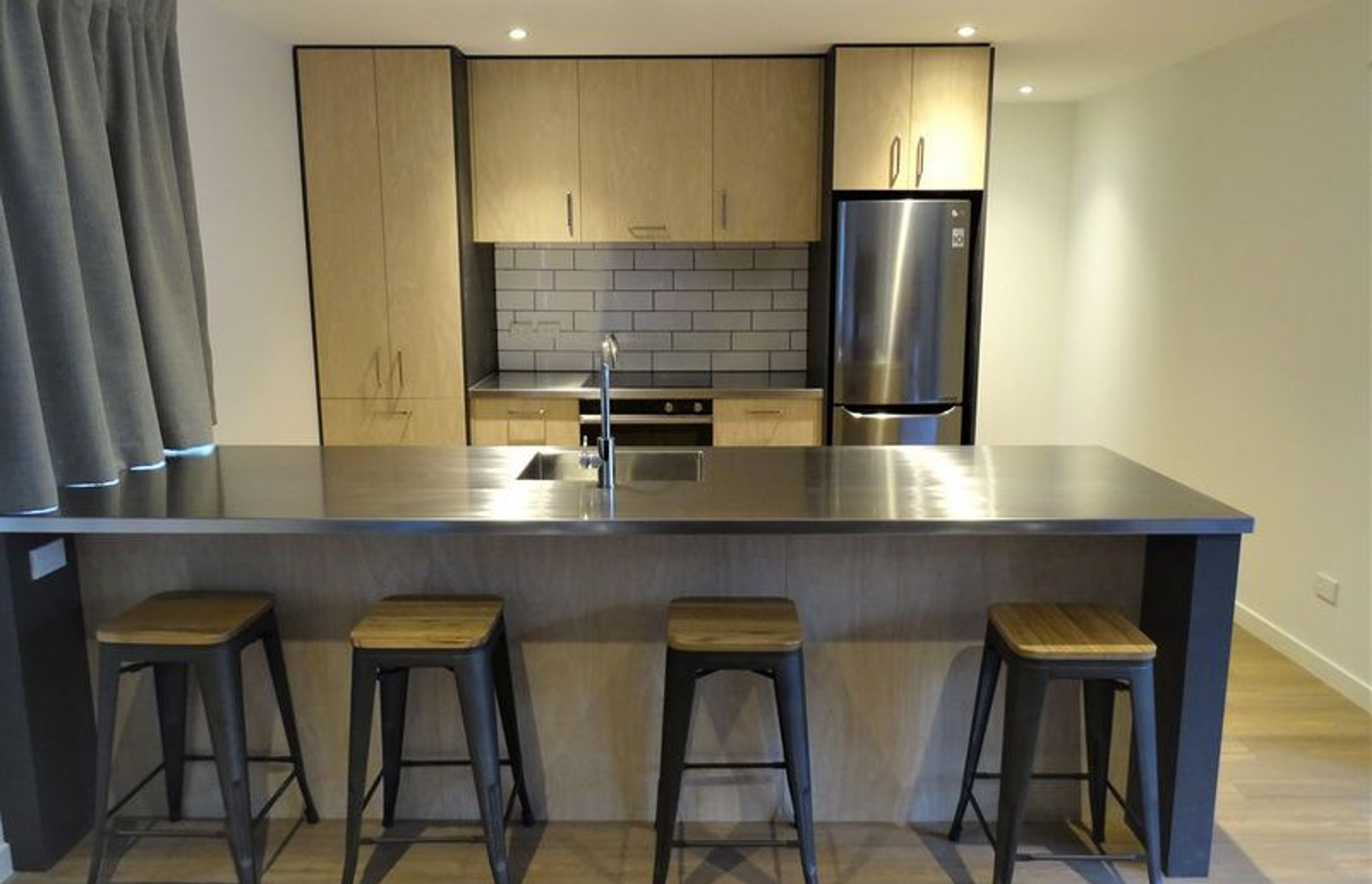 Breakfast bar area and kitchen overview