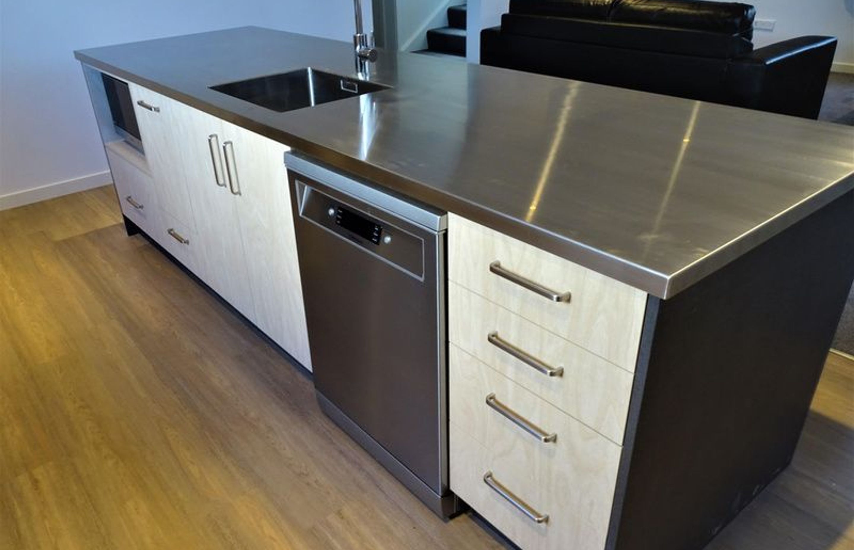 Breakfast bar area or kitchen island in Kitchen 1