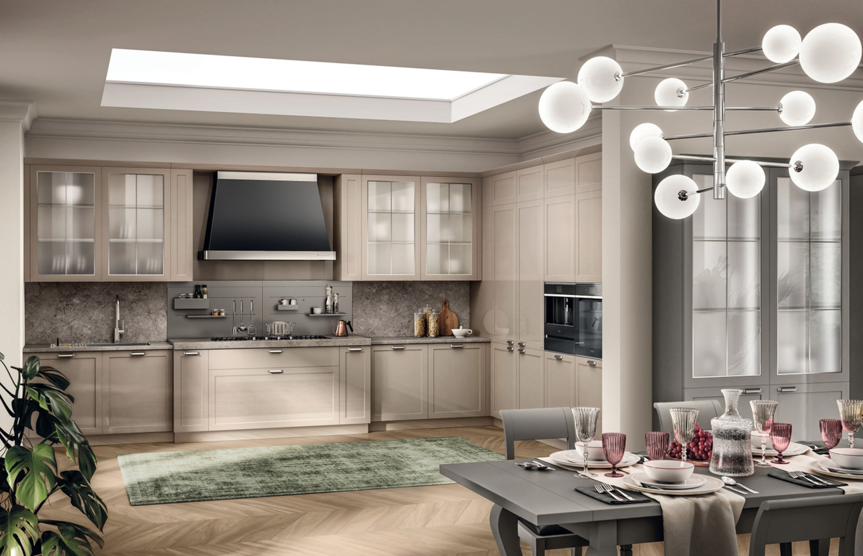 In a kitchen with a traditional layout, there is no shortage of interesting technical aspects: linear burners built into the Grigio Billiemi marble top and Opus equipped wall panel in painted metal in Desert and Silver Dark colours.
