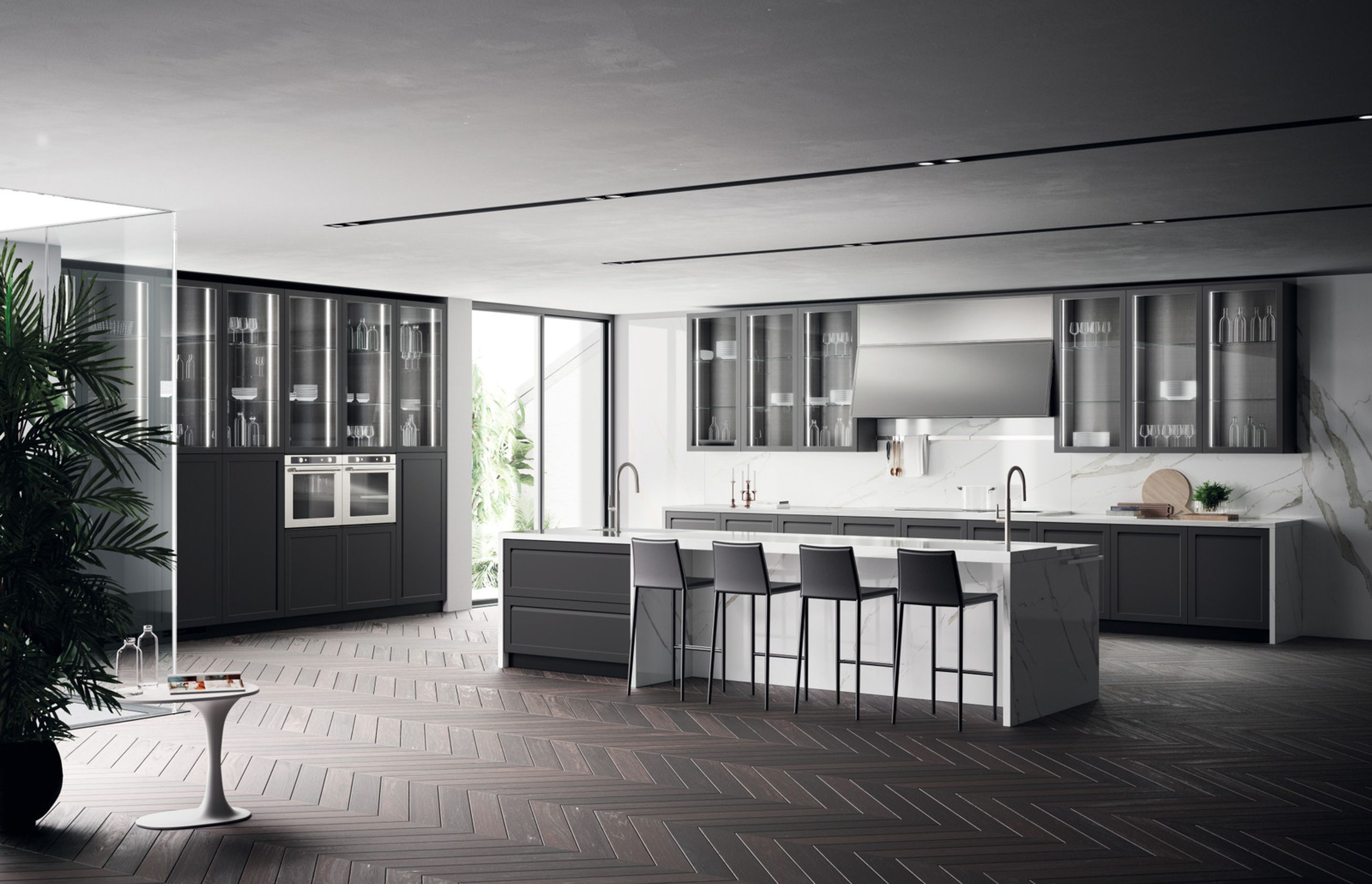 A distinguishing feature of Carattere, the grip built into the frame door (in Iron Grey lacquered finish, a very trendy shade), is capable of amplifying the unadulterated essence of the model. The handle grip is fitted horizontally on the base units, whereas on the cabinets it is arranged vertically: sophistication and clean-cut shapes that outline the furnishings.