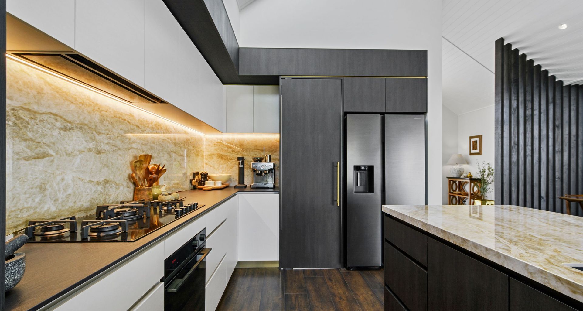 Dark Wood, Dekton, and Brass Details,  Waimauku banner