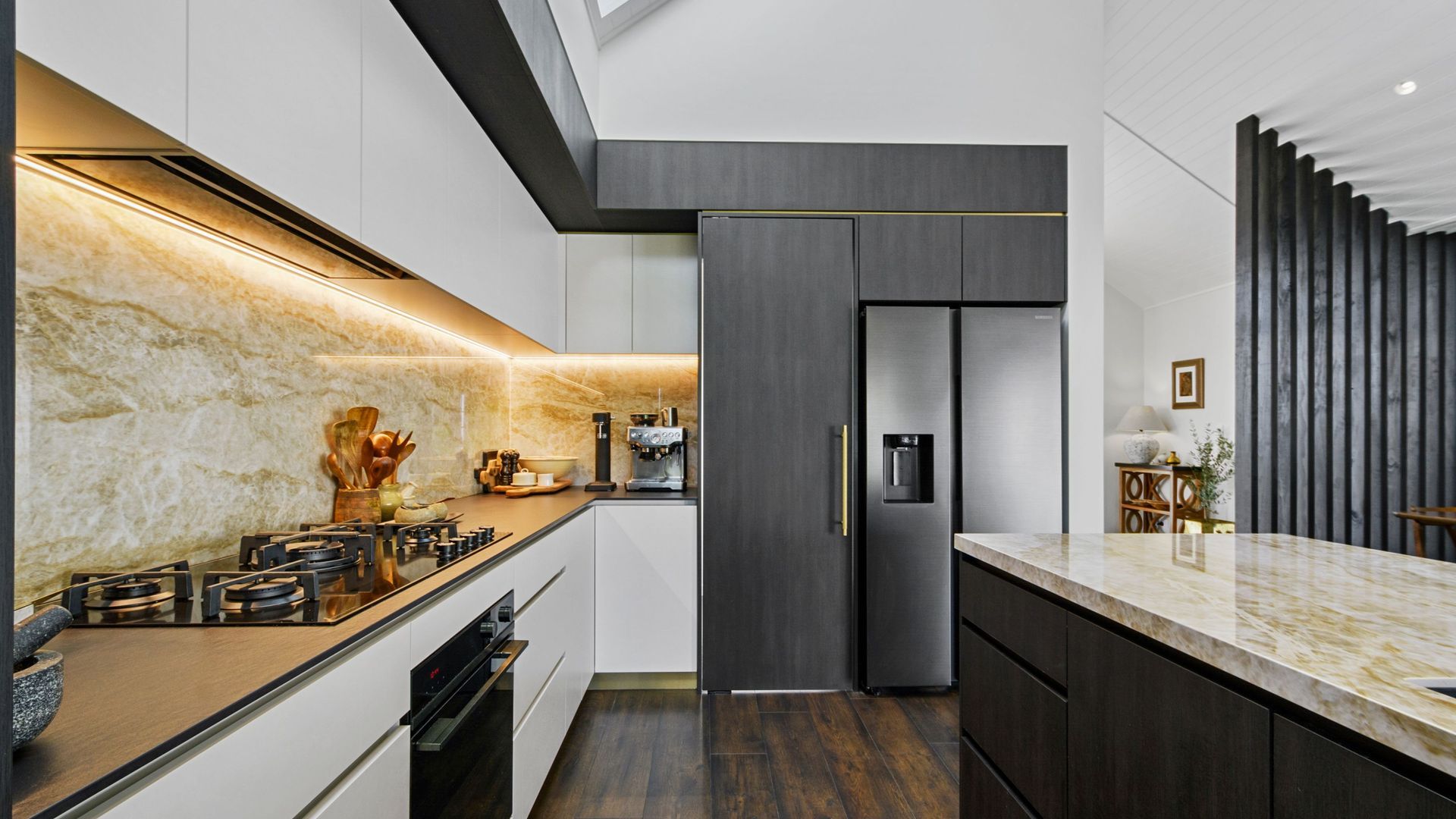 Dark Wood, Dekton, and Brass Details,  Waimauku banner