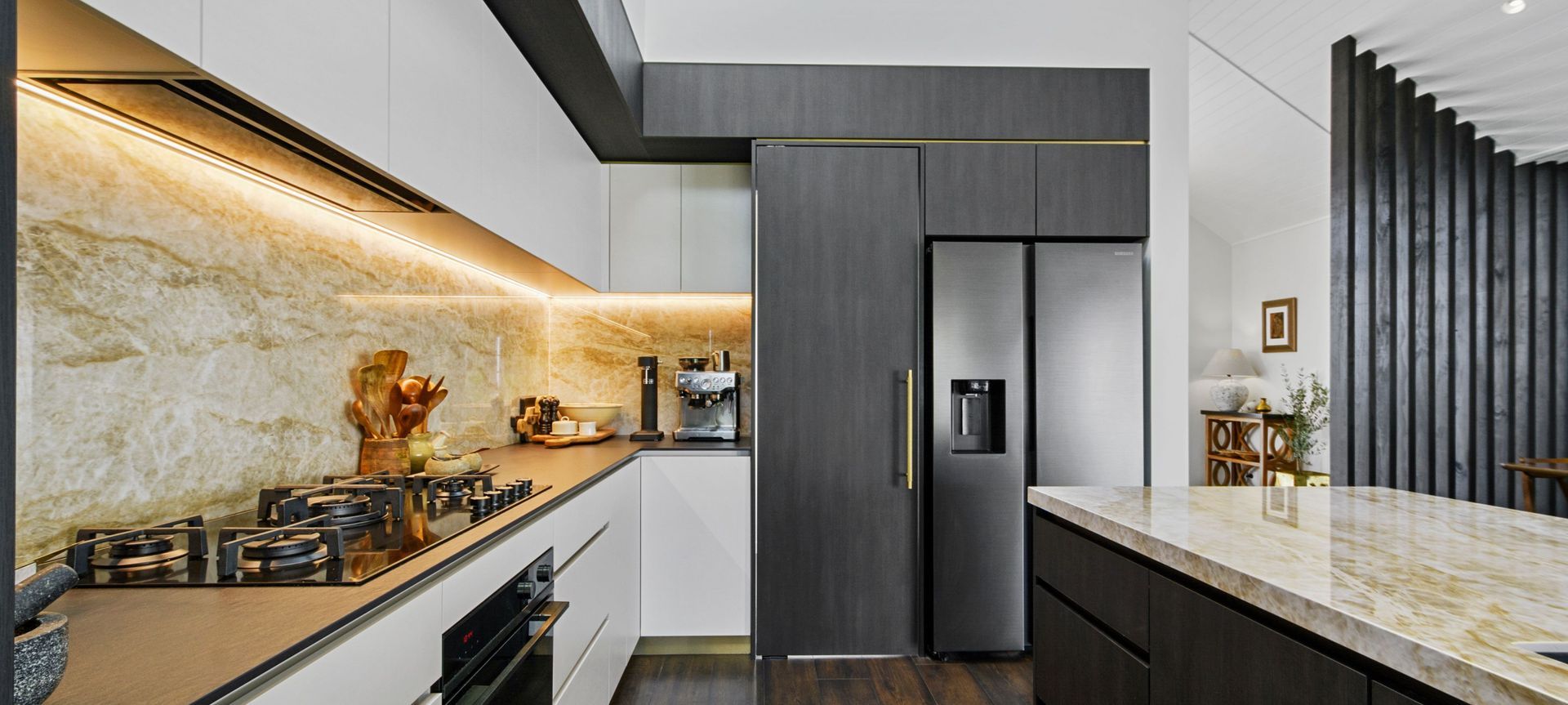 Dark Wood, Dekton, and Brass Details,  Waimauku banner