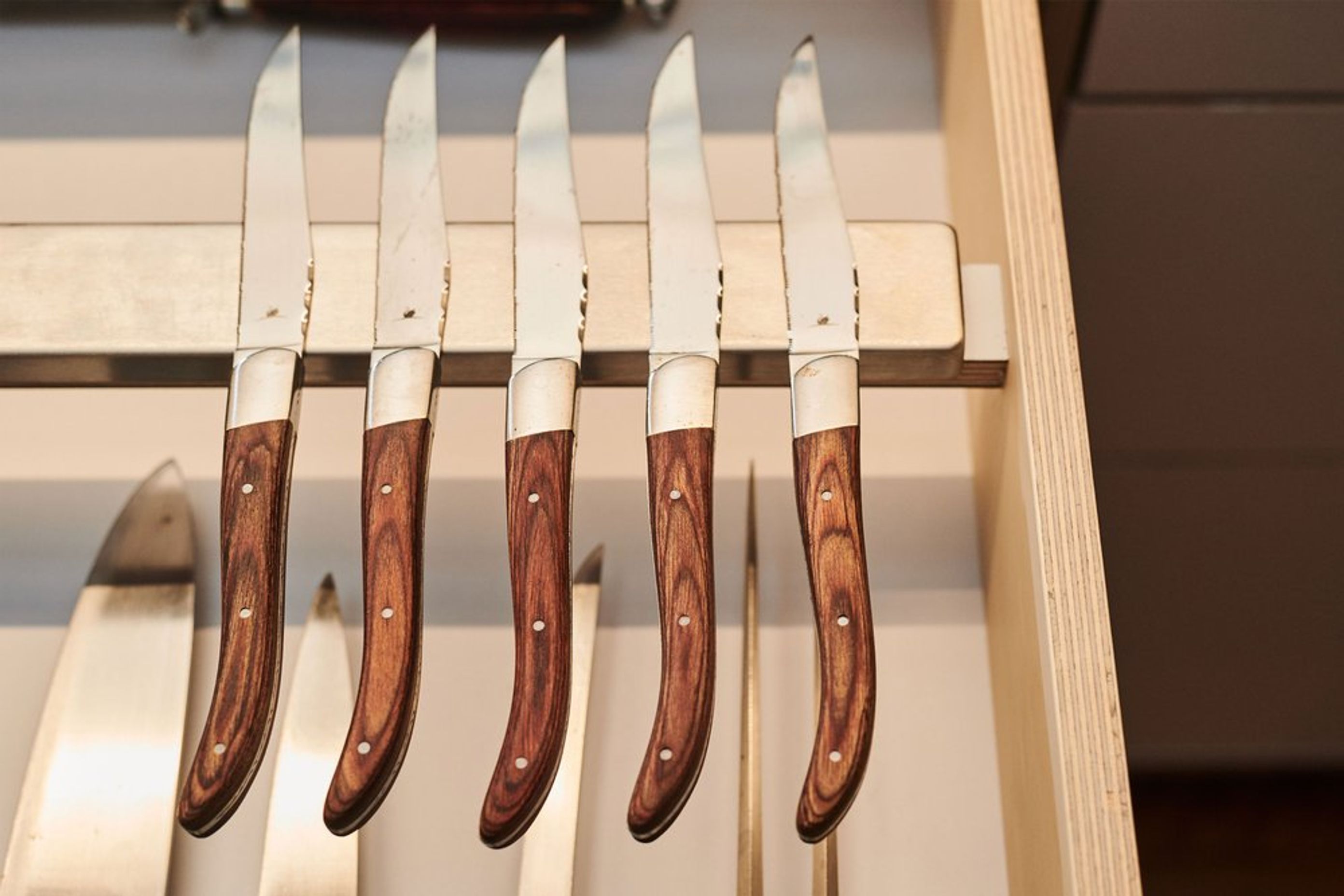 Chris’ drawers are tailored to suit his expansive collection of cookware and utensils.