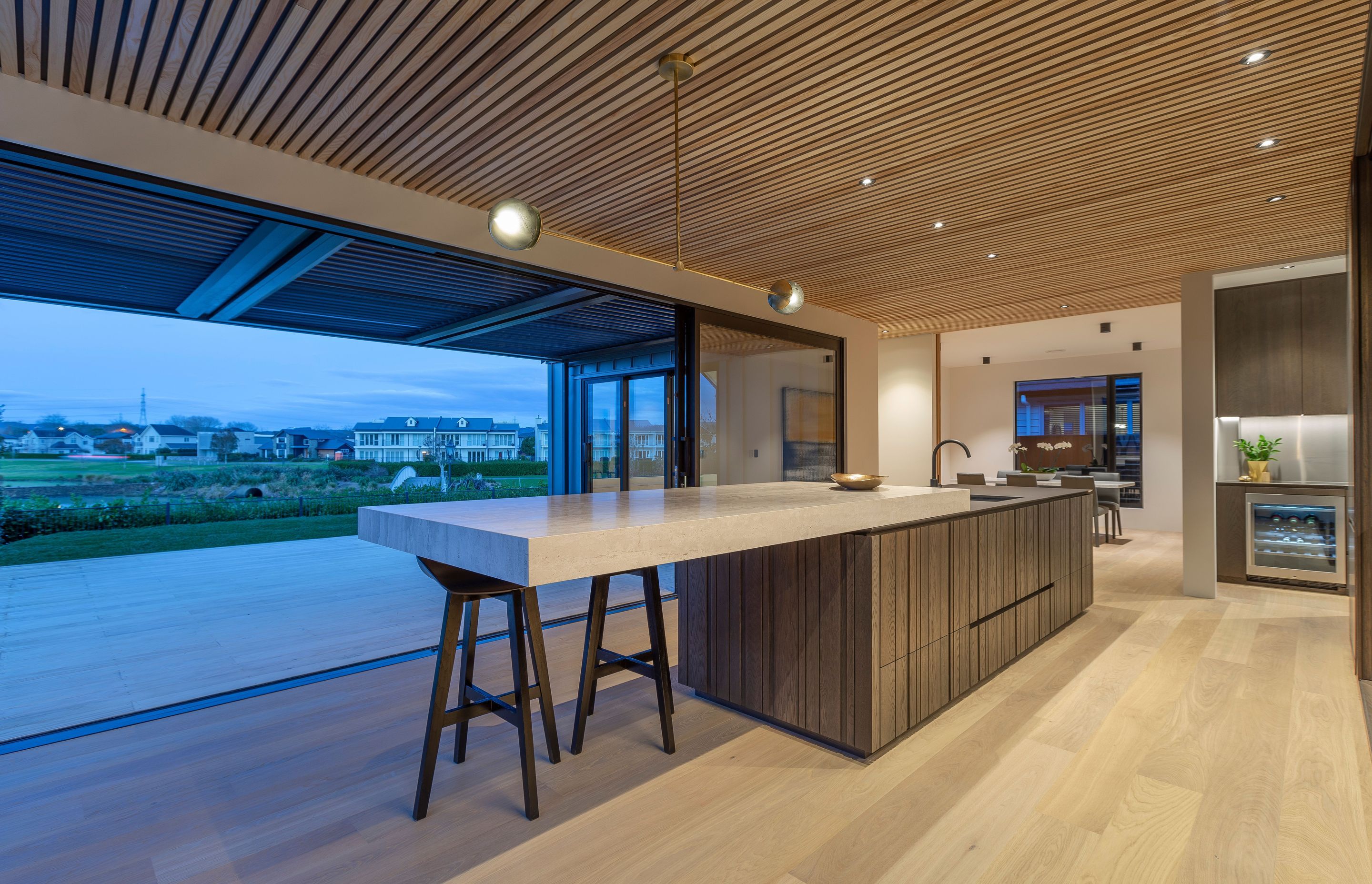 Dramatic kitchen with handleless design in a rural setting