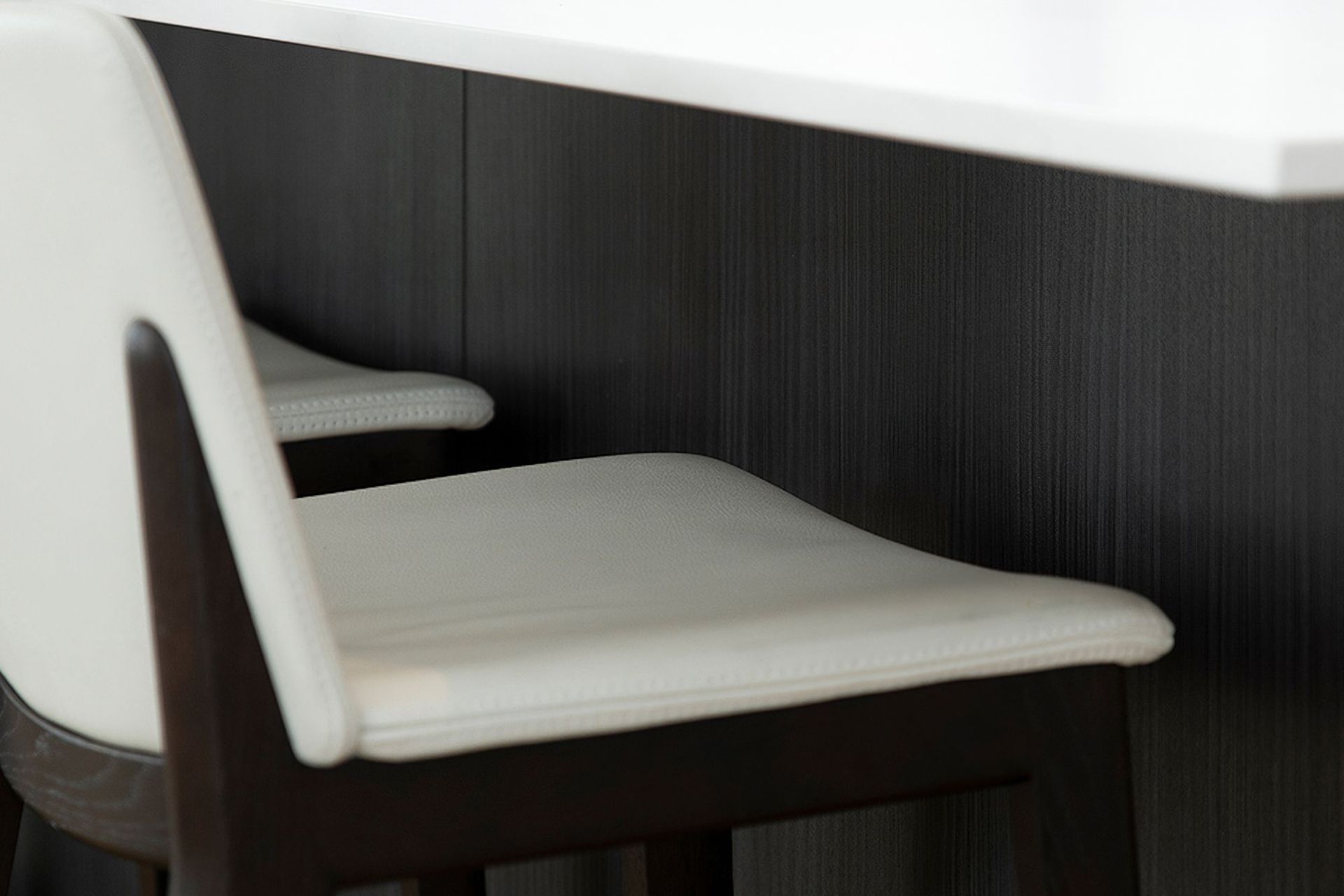 Milan profile in Hacienda Black - Woodgrain. Design by Modern Kitchens. Photography by Liam Dijk.