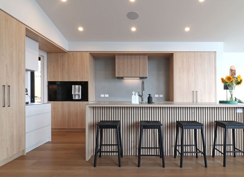 Elevated Elegance: A Family Kitchen Framing Harbour Views