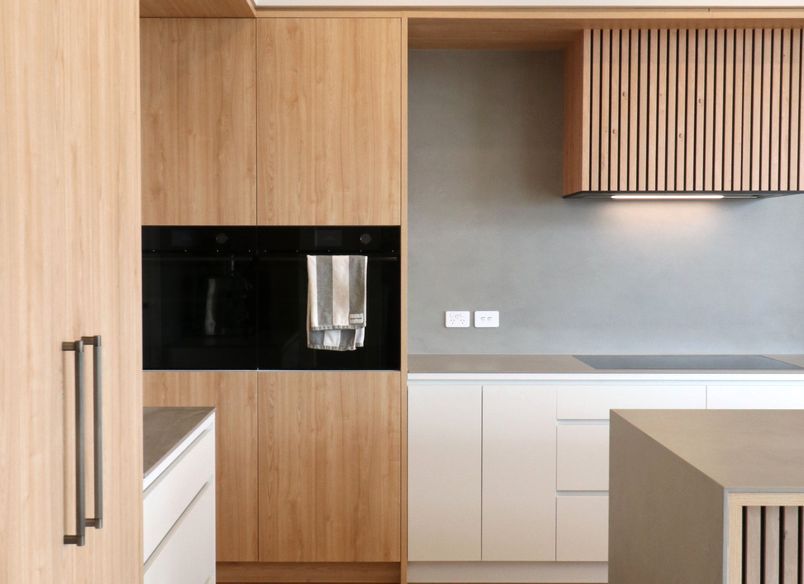 Elevated Elegance: A Family Kitchen Framing Harbour Views