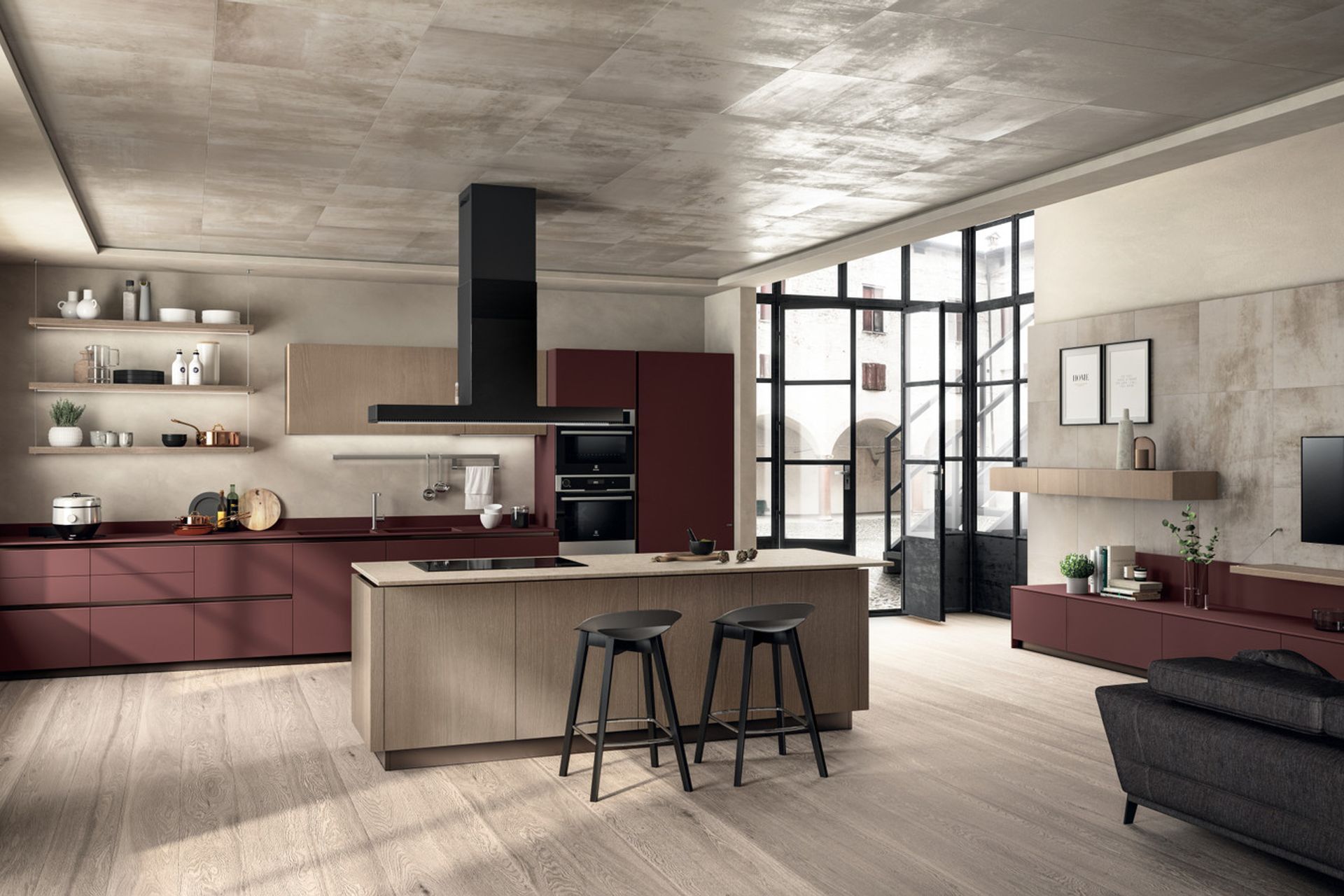 Jaipur Red Fenix NTM® laminate distinguishes the 12 mm-thick worktop, the washing area with built-in sink basins and the doors of the wall-mounted composition to create an elemental, modern and highly functional style. The worktop on the island and cooking area is on the other hand in Coral Clay Quarz (20 mm thick), blending in seamlessly with the colours of this room.