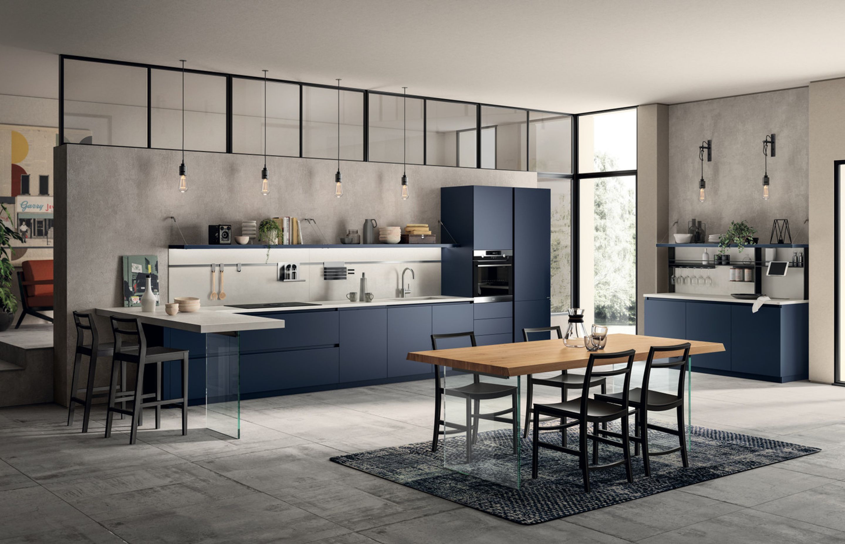 Moon Blue matt lacquered finish of the composition (door, recessed grip profle and plinth): for those who appreciate attention to detail. Attractive contrasting textures between the peninsula worktop in Calce Bianco Porcelain Stoneware and the glass Levity support.