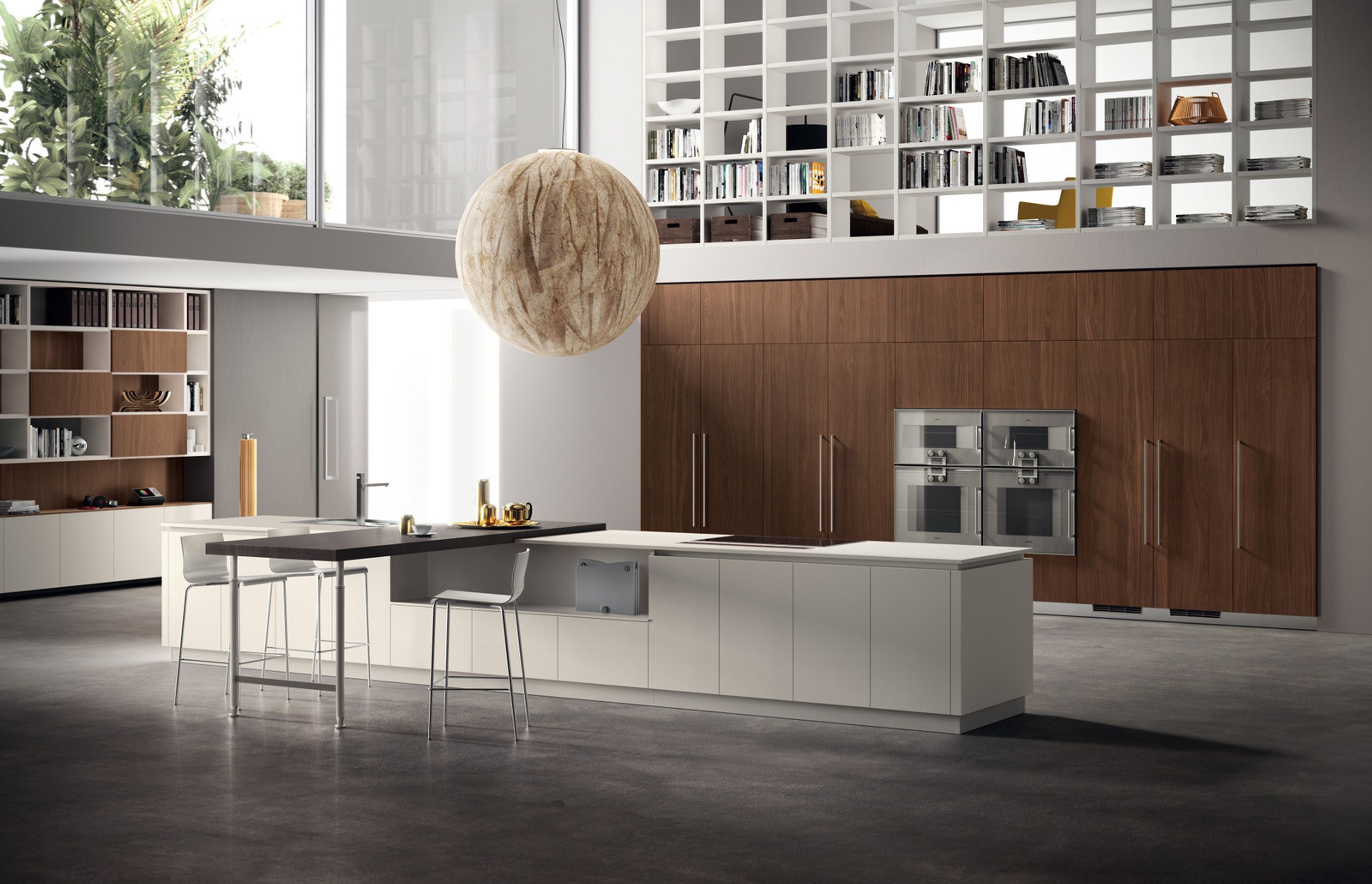 A composition with significant volumes, where the undisputed stars are the materials: Sunset Walnut with an elegant vertical grain for the large cabinets, Malé White Fenix NTM® for the island base units and panelled Nabuk Oak for the breakfast bench top, ftted with Slender adjustable support.